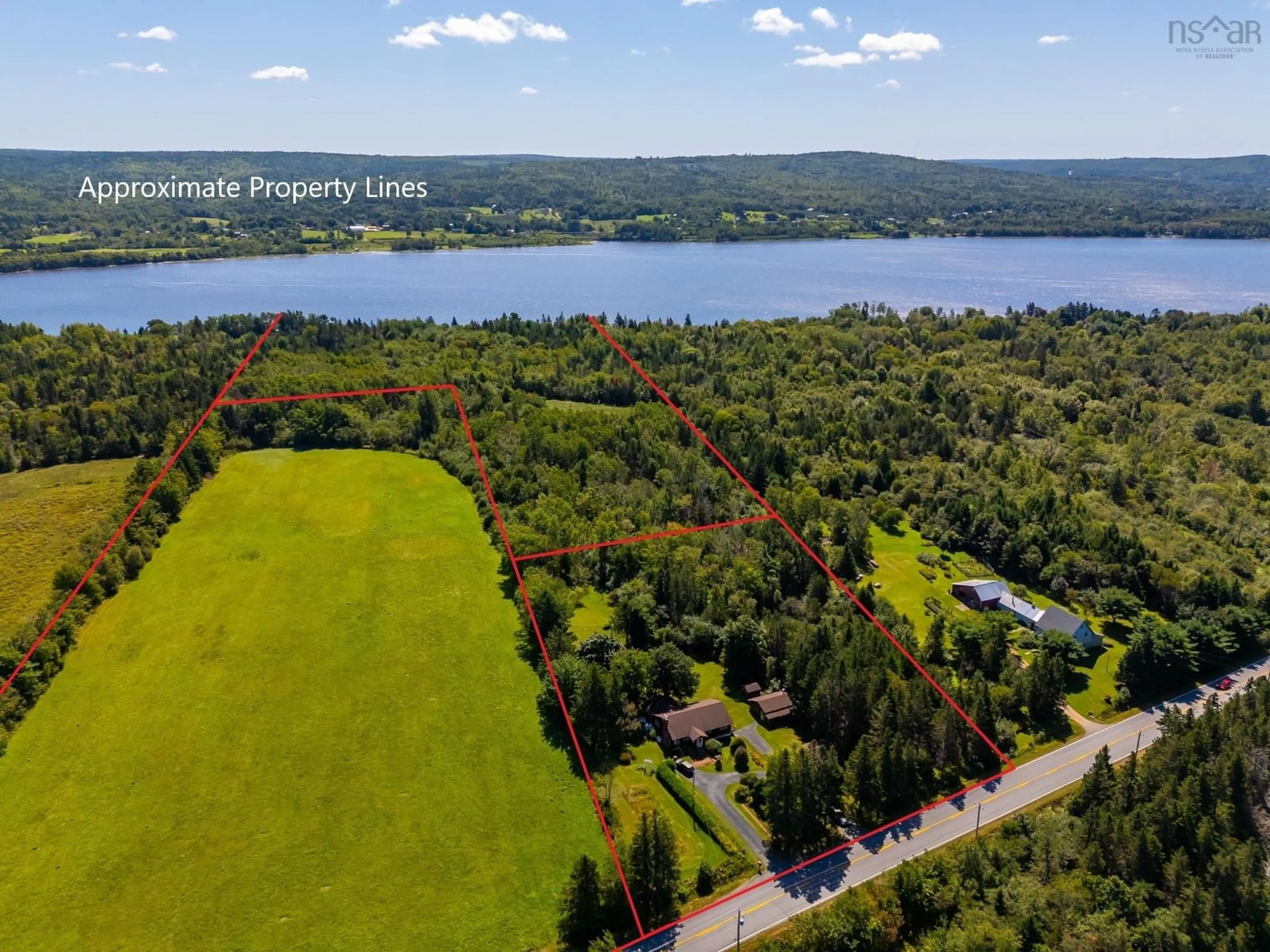 A pic from outside/outdoor area/front of a property/back of a property/a pic from drone, water/lake/river/ocean view for 5270 Highway 1, Granville Centre Nova Scotia B0S 1A0