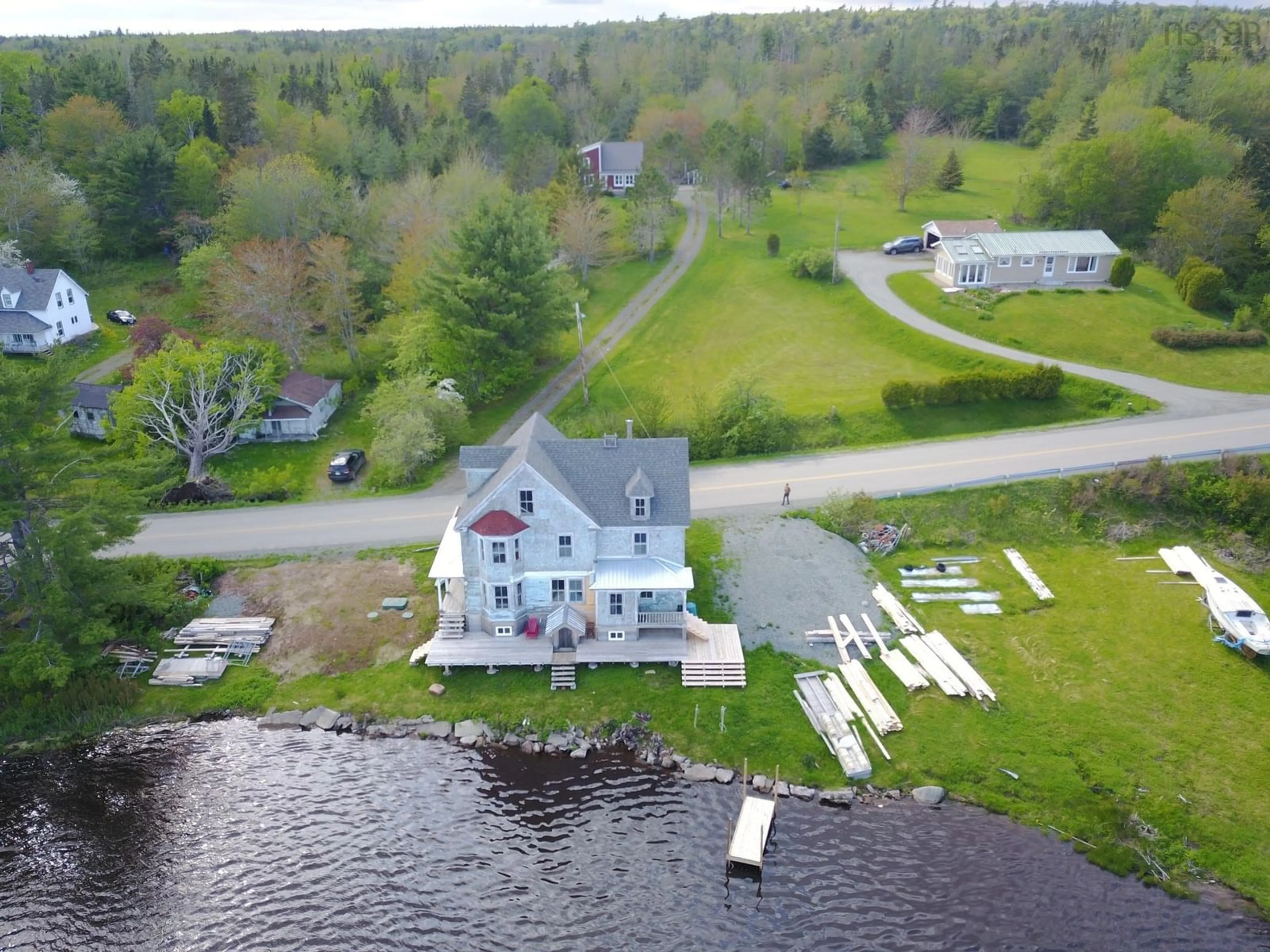 A pic from outside/outdoor area/front of a property/back of a property/a pic from drone, water/lake/river/ocean view for 2160 Marble Mountain Rd, West Bay Nova Scotia B0E 3K0