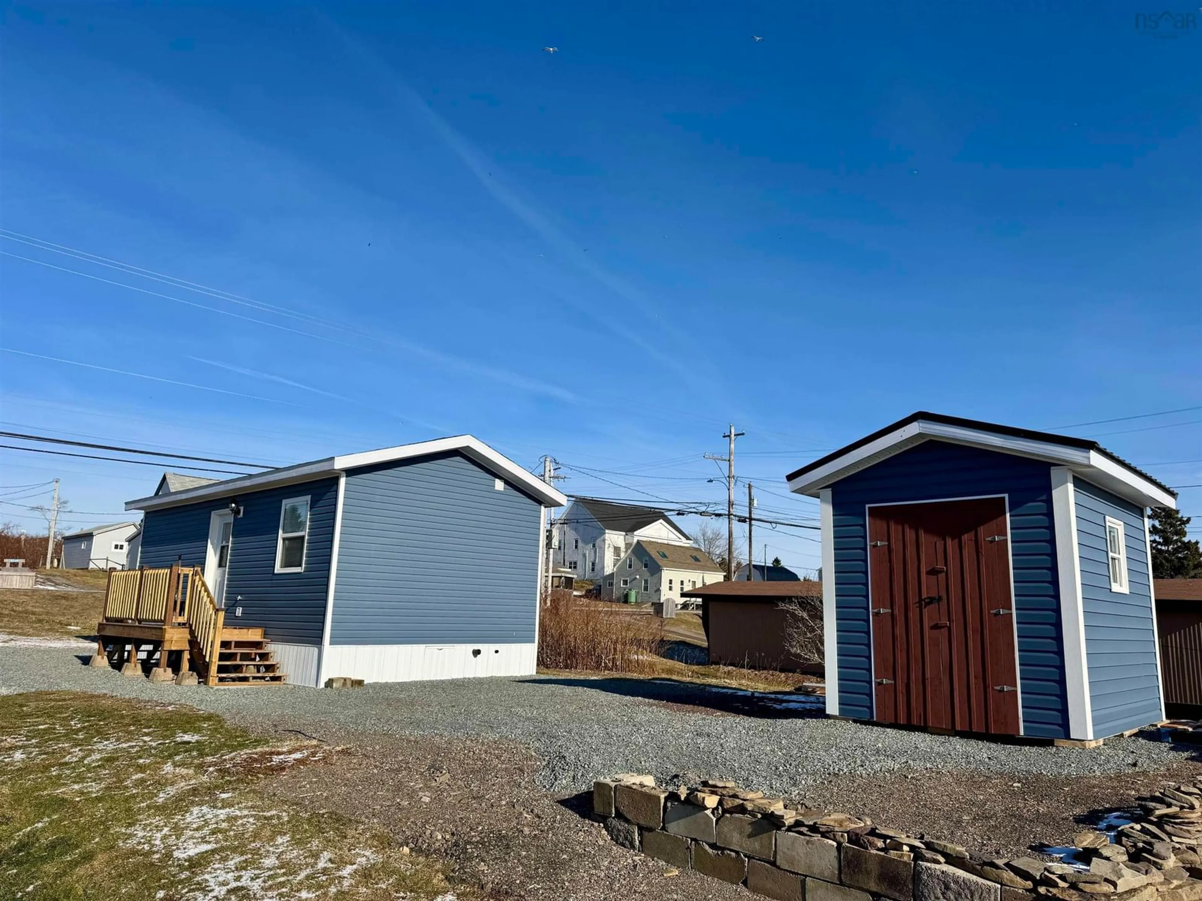 A pic from outside/outdoor area/front of a property/back of a property/a pic from drone, unknown for 2542 Highway 206, Arichat Nova Scotia B0E 1A0