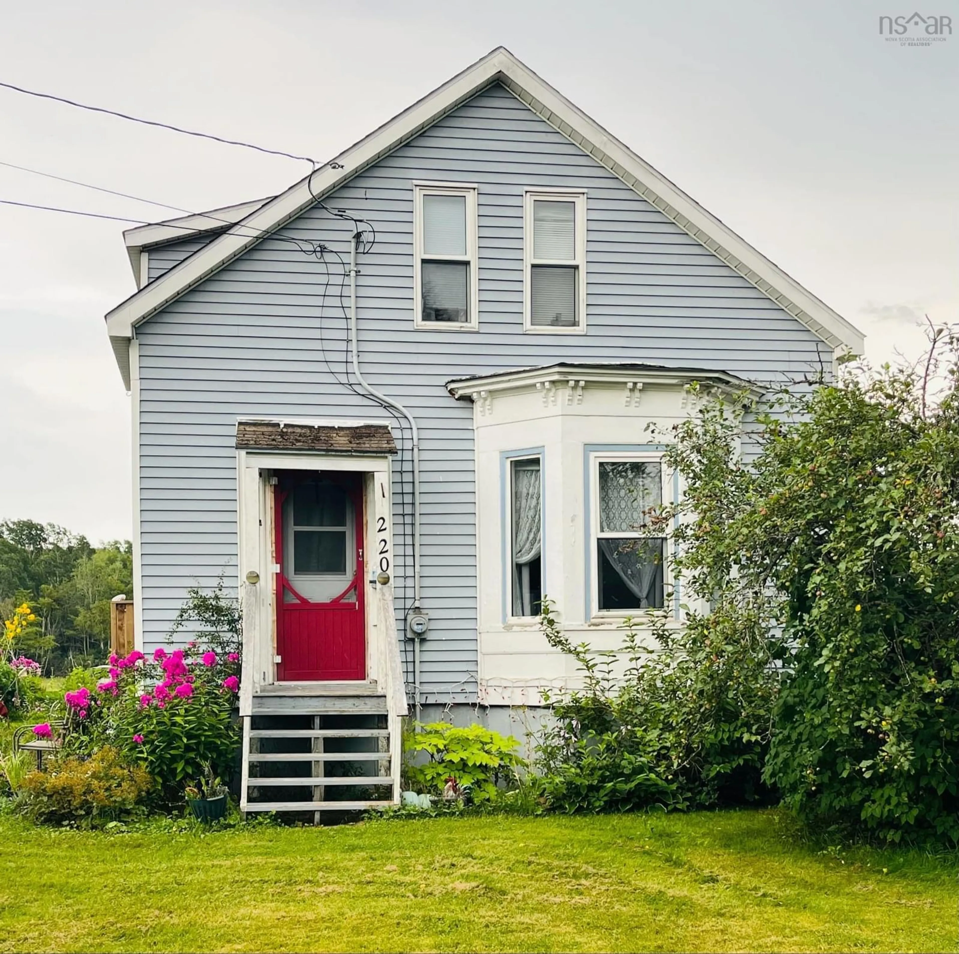 Home with vinyl exterior material, street for 220 Willow St, Parrsboro Nova Scotia B0M 1S0