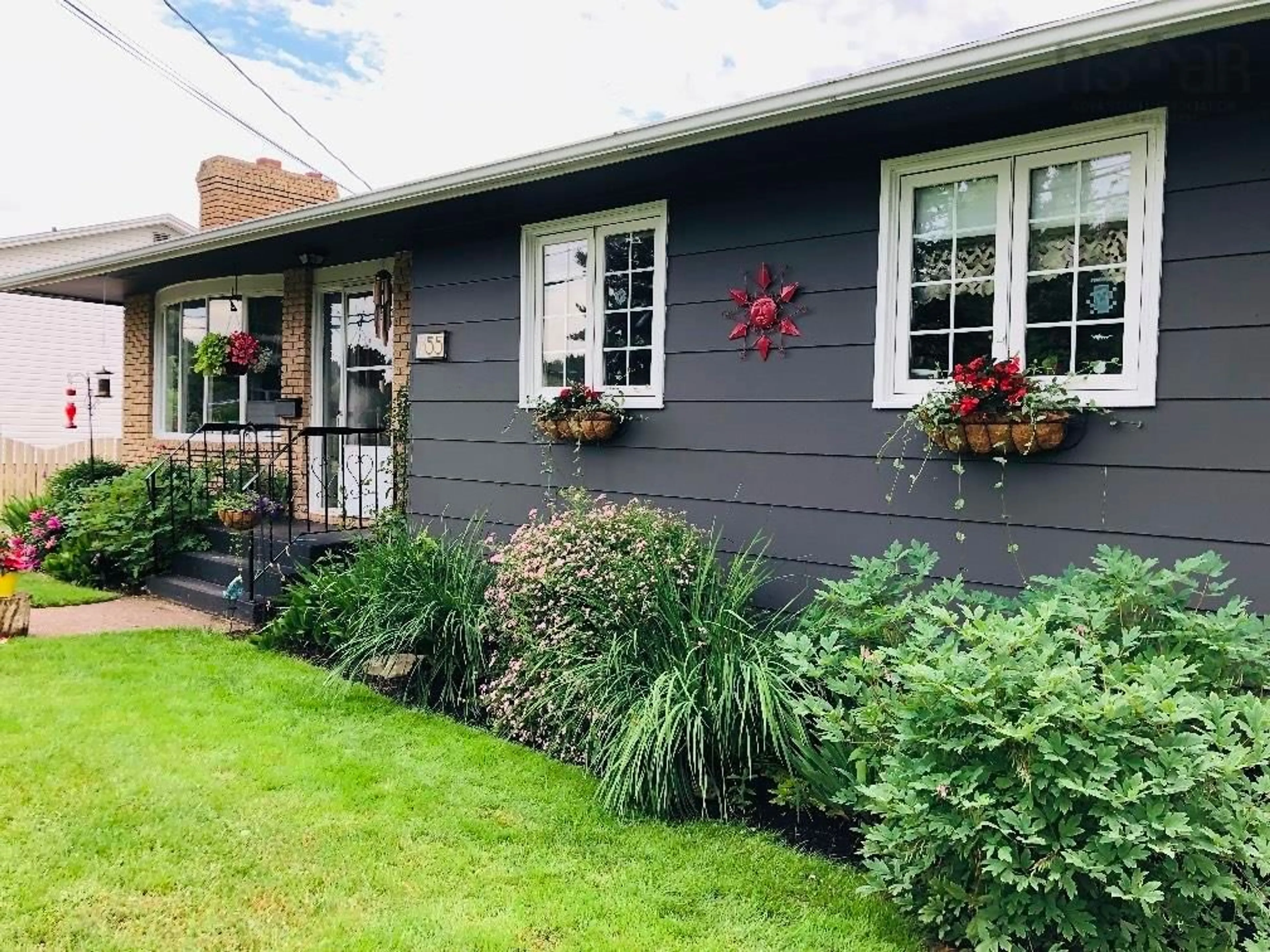 Home with vinyl exterior material, street for 55 Birch St, Salmon River Nova Scotia B2N 4W9