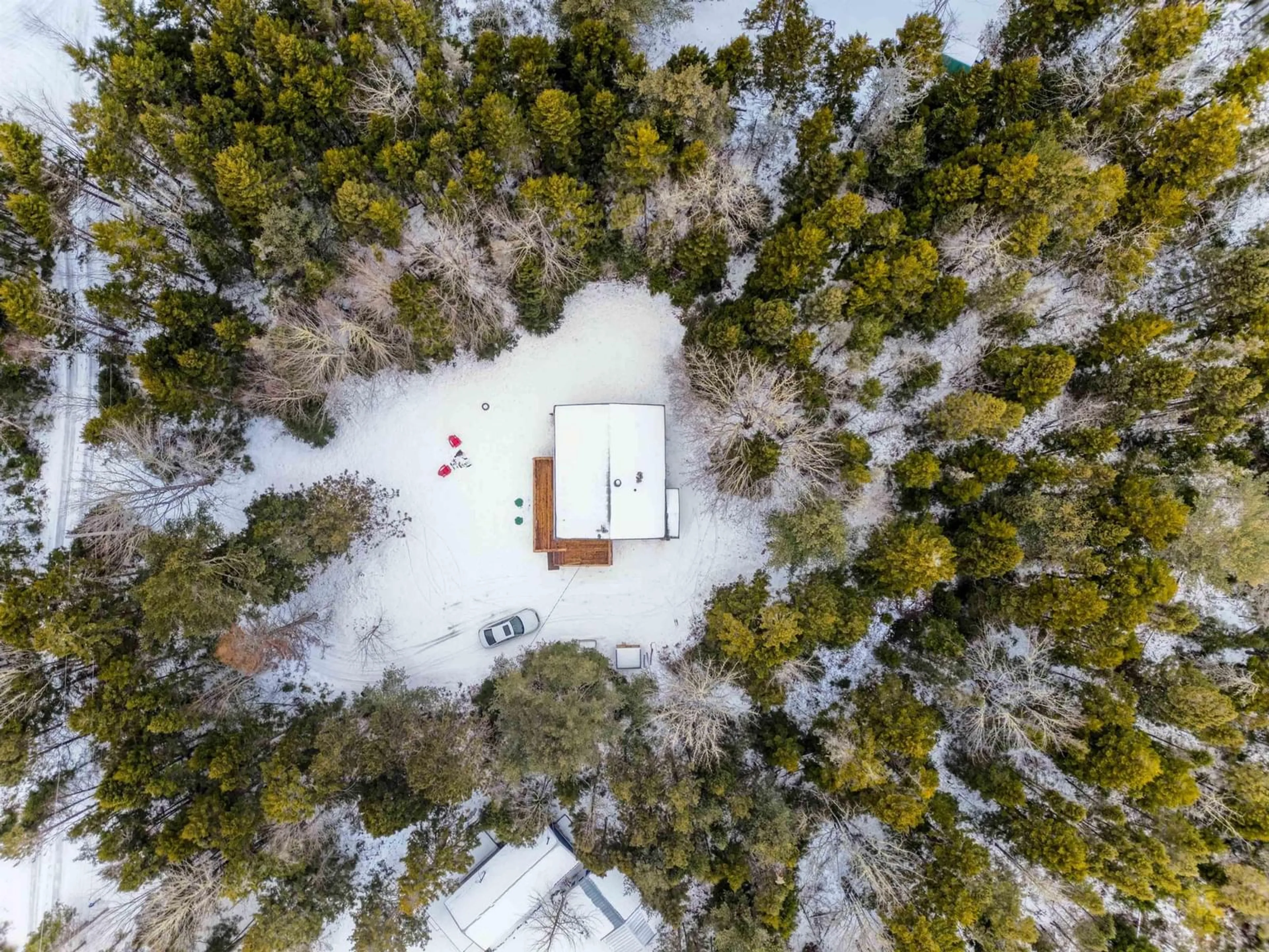 A pic from outside/outdoor area/front of a property/back of a property/a pic from drone, forest/trees view for 5 Duck Pond Rd, Five Houses Nova Scotia B0M 1B0