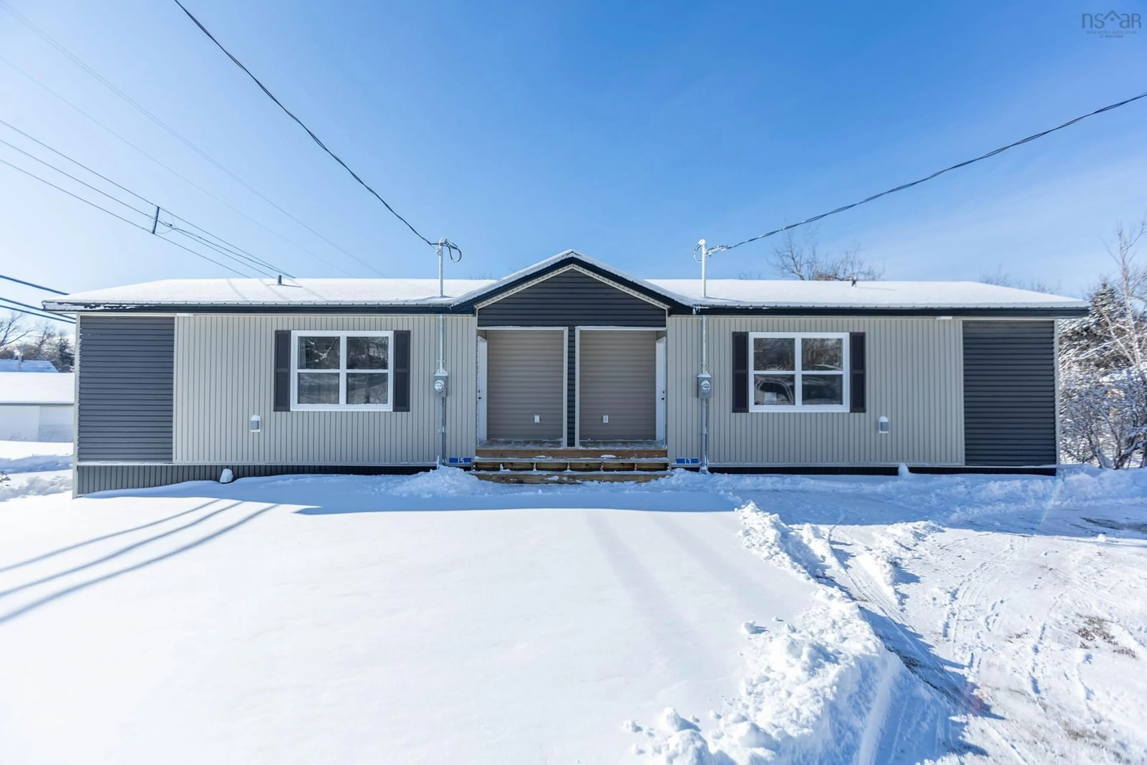 Home with vinyl exterior material, street for 13-15 Mechanic St, Springhill Nova Scotia B0M 1X0