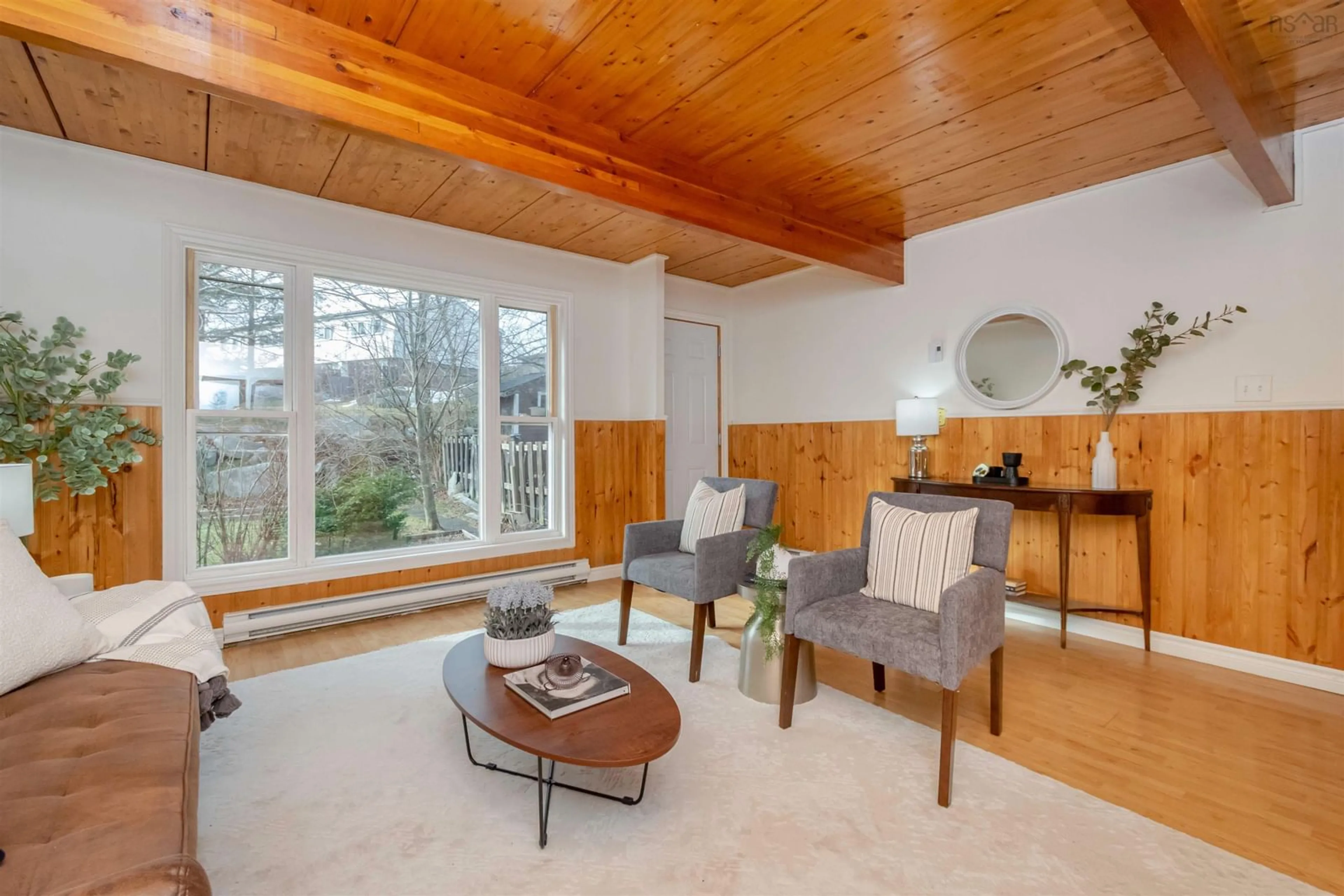 Living room with furniture, wood/laminate floor for 94 Shepherd Rd, Cowie Hill Nova Scotia B3P 2K8