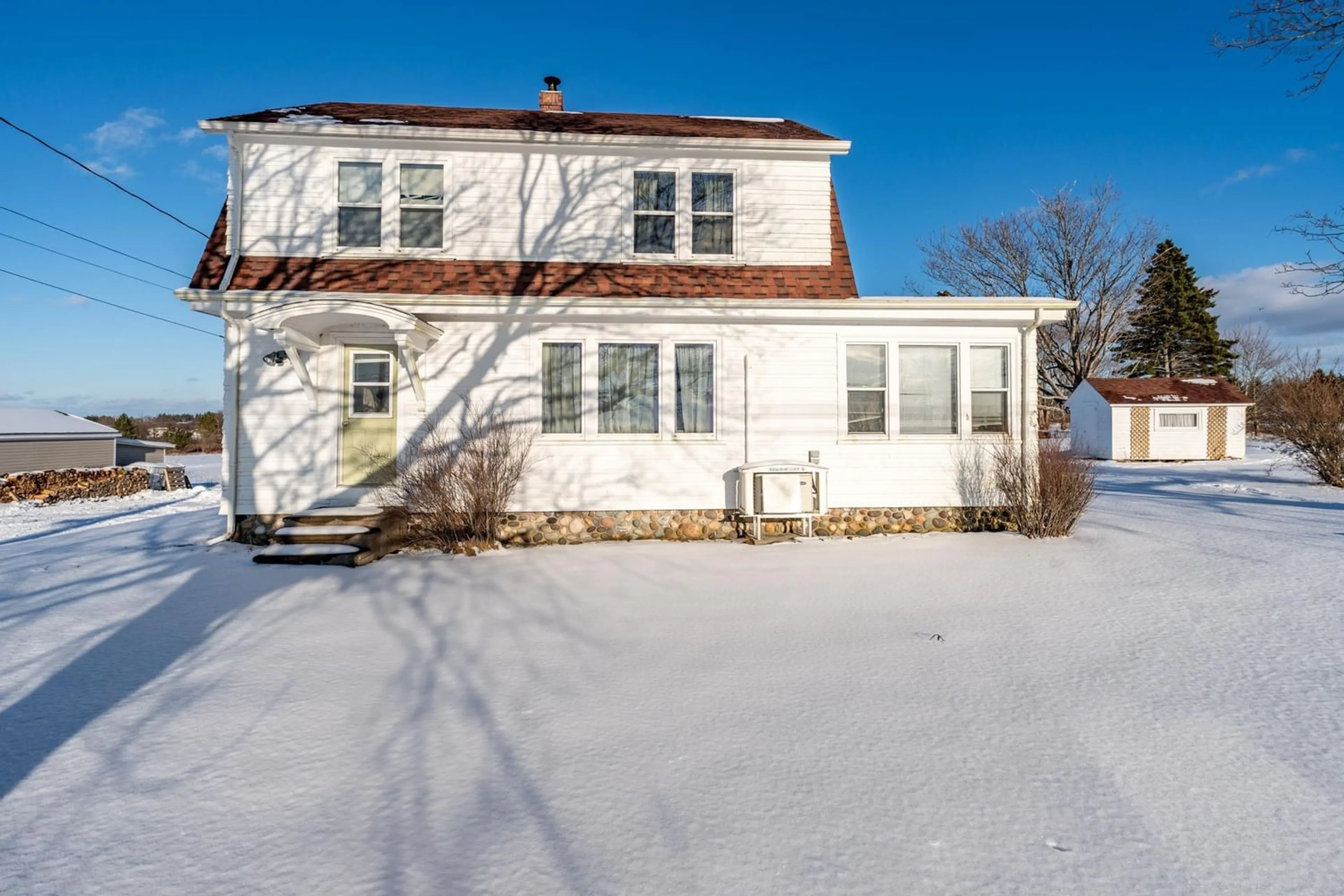 A pic from outside/outdoor area/front of a property/back of a property/a pic from drone, street for 8882 Highway 1, Meteghan River Nova Scotia B0W 2L0