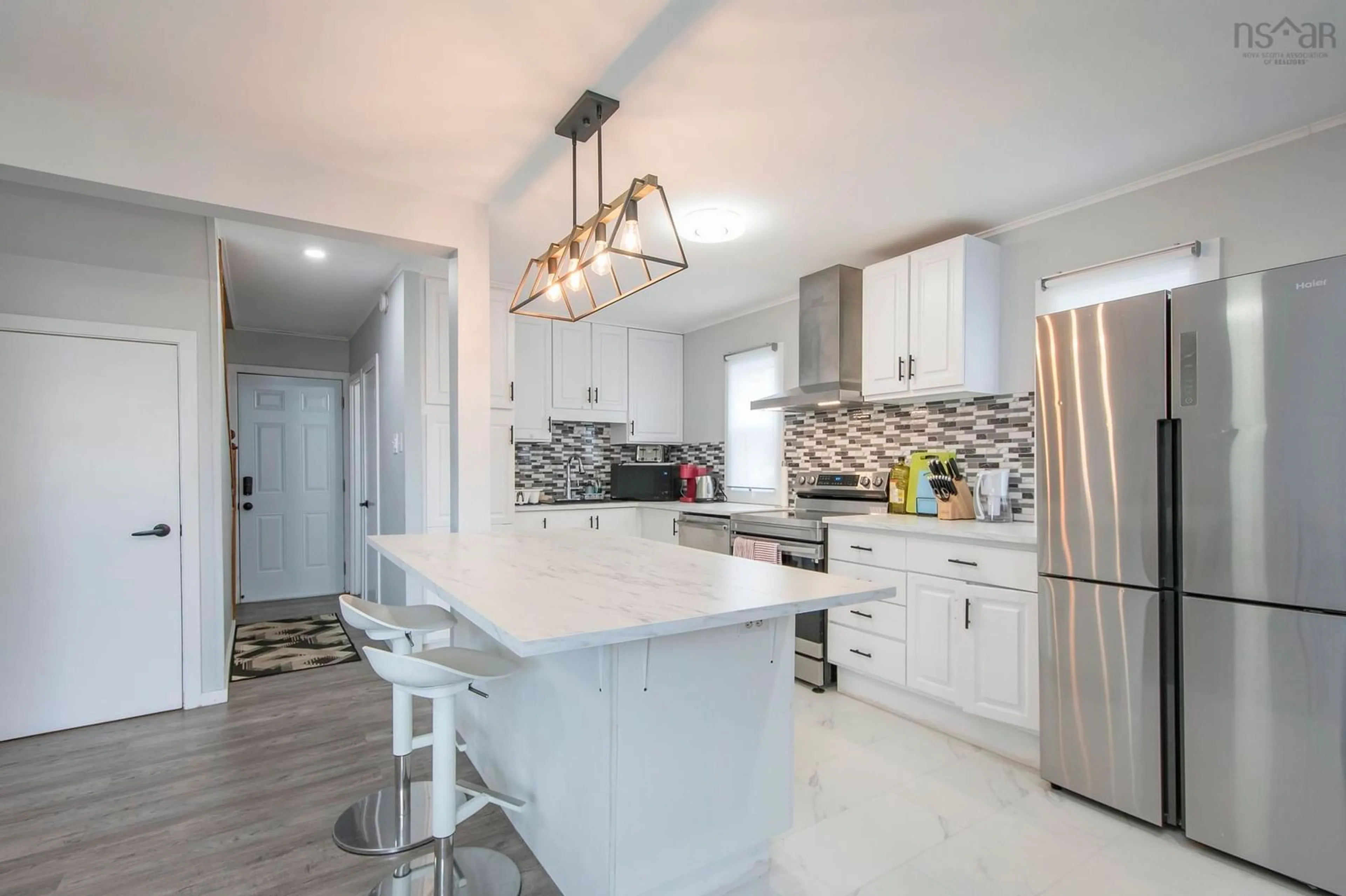 Open concept kitchen, ceramic/tile floor for 6975 Ward Ave, Halifax Nova Scotia B3L 2K6