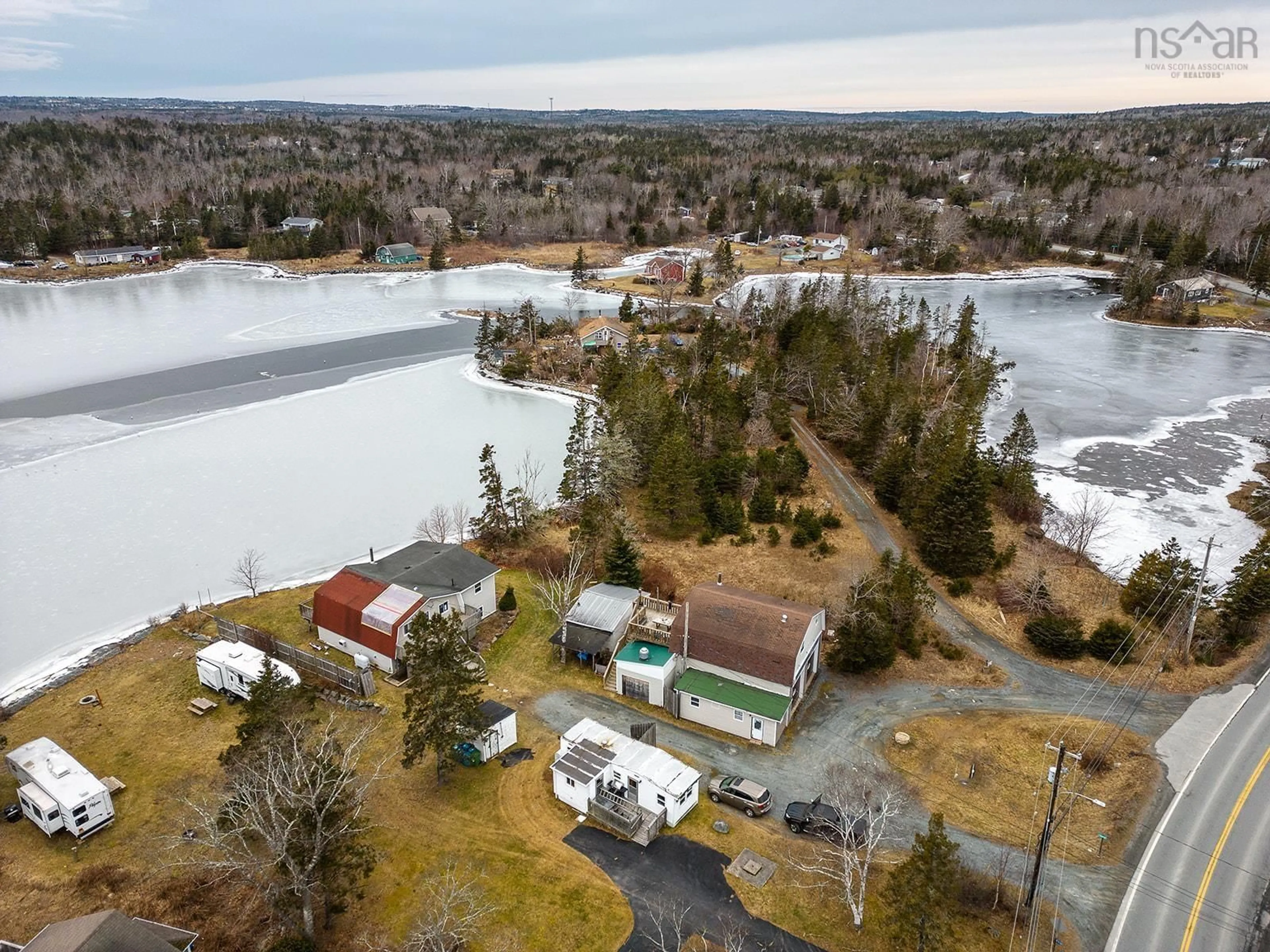 A pic from outside/outdoor area/front of a property/back of a property/a pic from drone, water/lake/river/ocean view for 2414 Lawrencetown Rd, Lawrencetown Nova Scotia B2Z 1L6