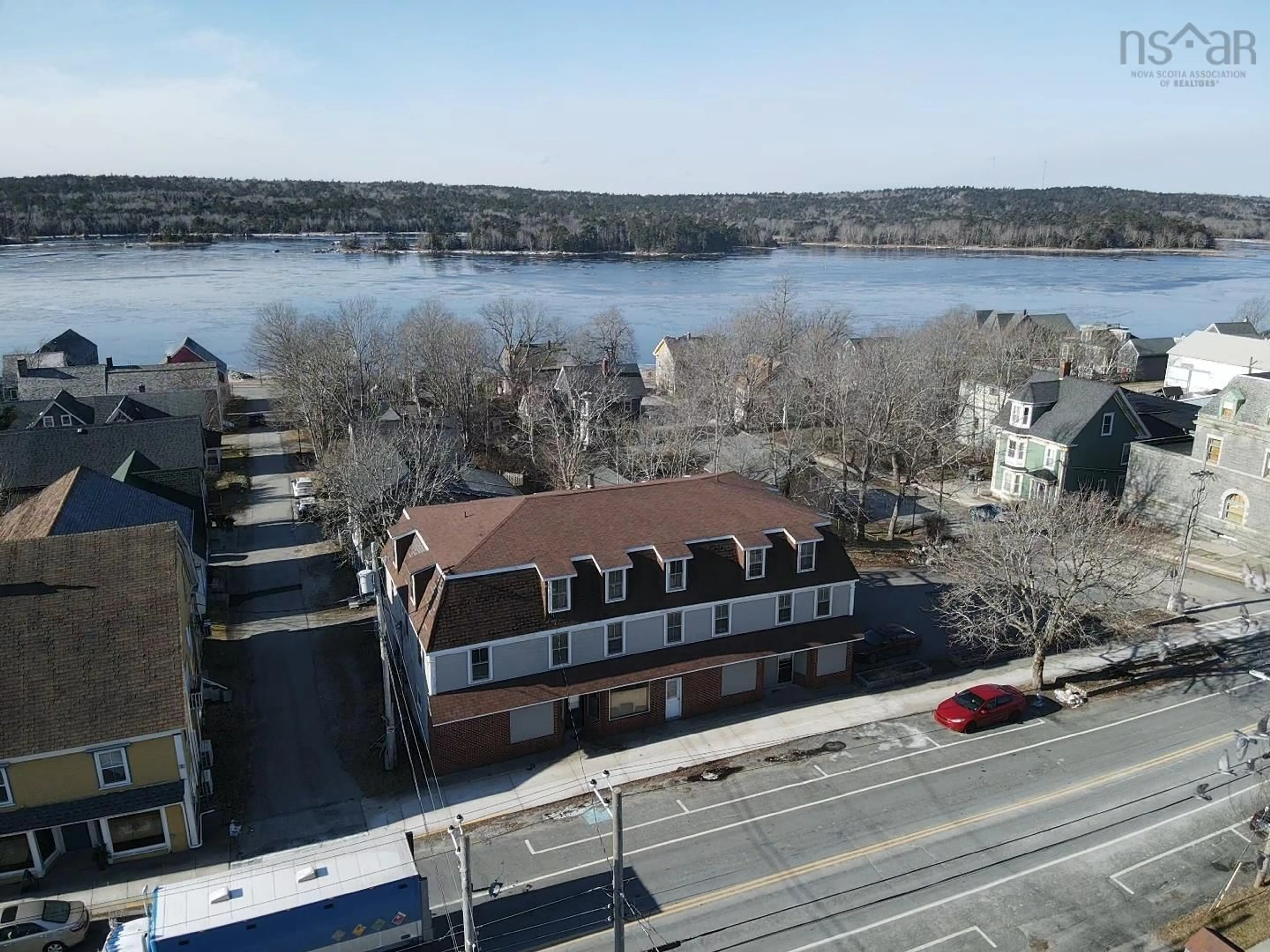 A pic from outside/outdoor area/front of a property/back of a property/a pic from drone, water/lake/river/ocean view for 137 Water St, Shelburne Nova Scotia B0T 1W0