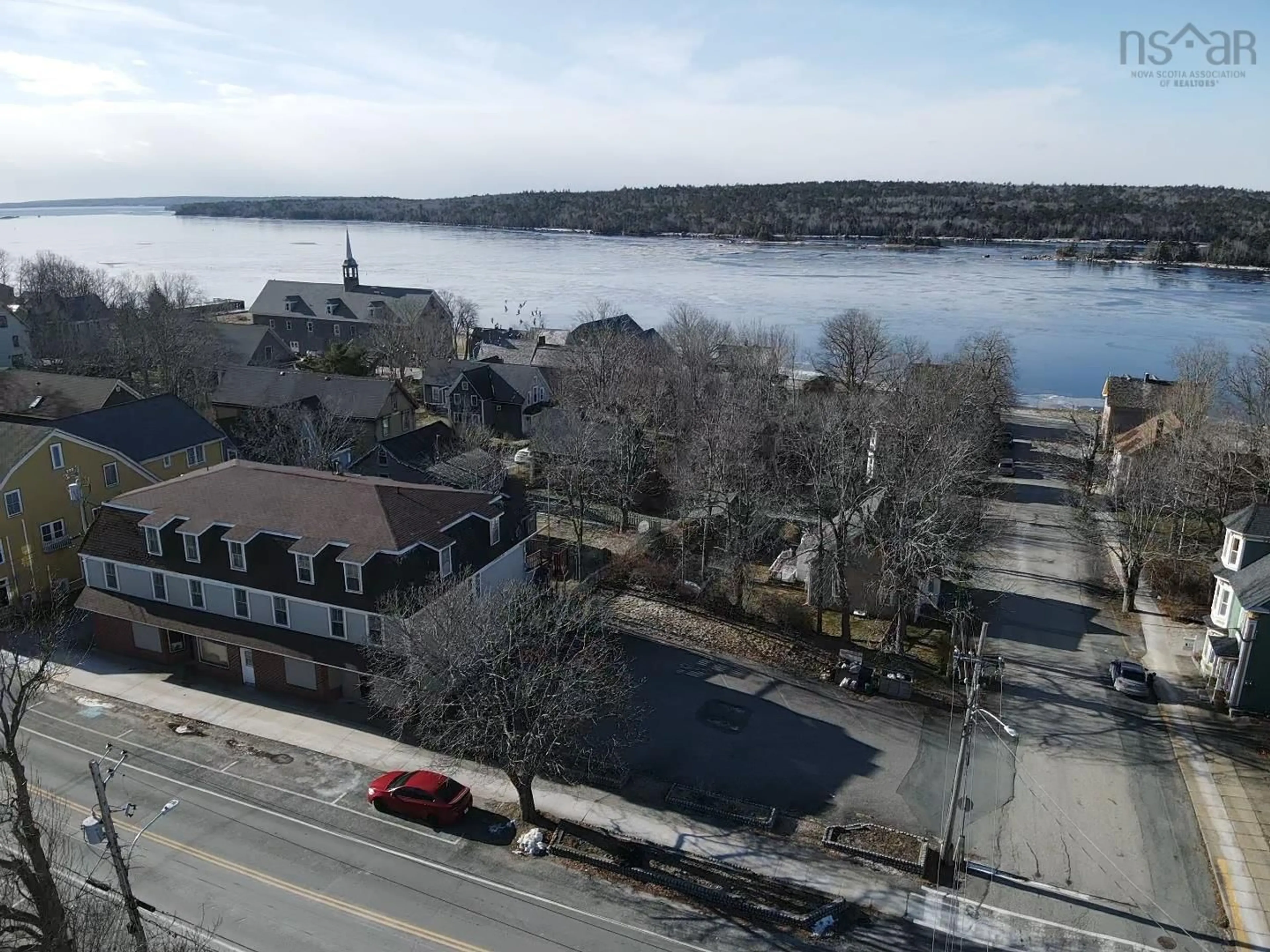 A pic from outside/outdoor area/front of a property/back of a property/a pic from drone, water/lake/river/ocean view for 137 Water St, Shelburne Nova Scotia B0T 1W0