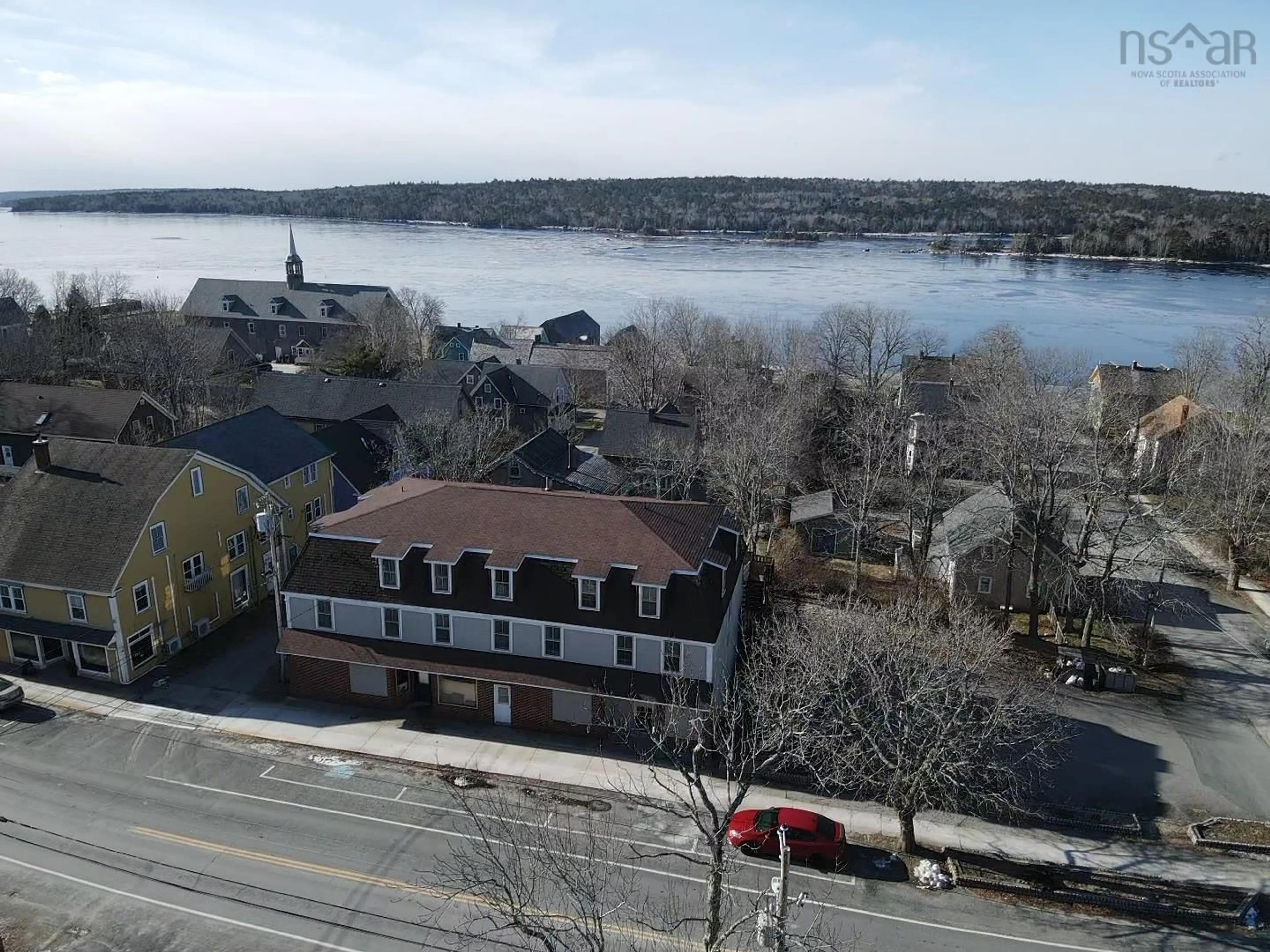 A pic from outside/outdoor area/front of a property/back of a property/a pic from drone, water/lake/river/ocean view for 137 Water St, Shelburne Nova Scotia B0T 1W0