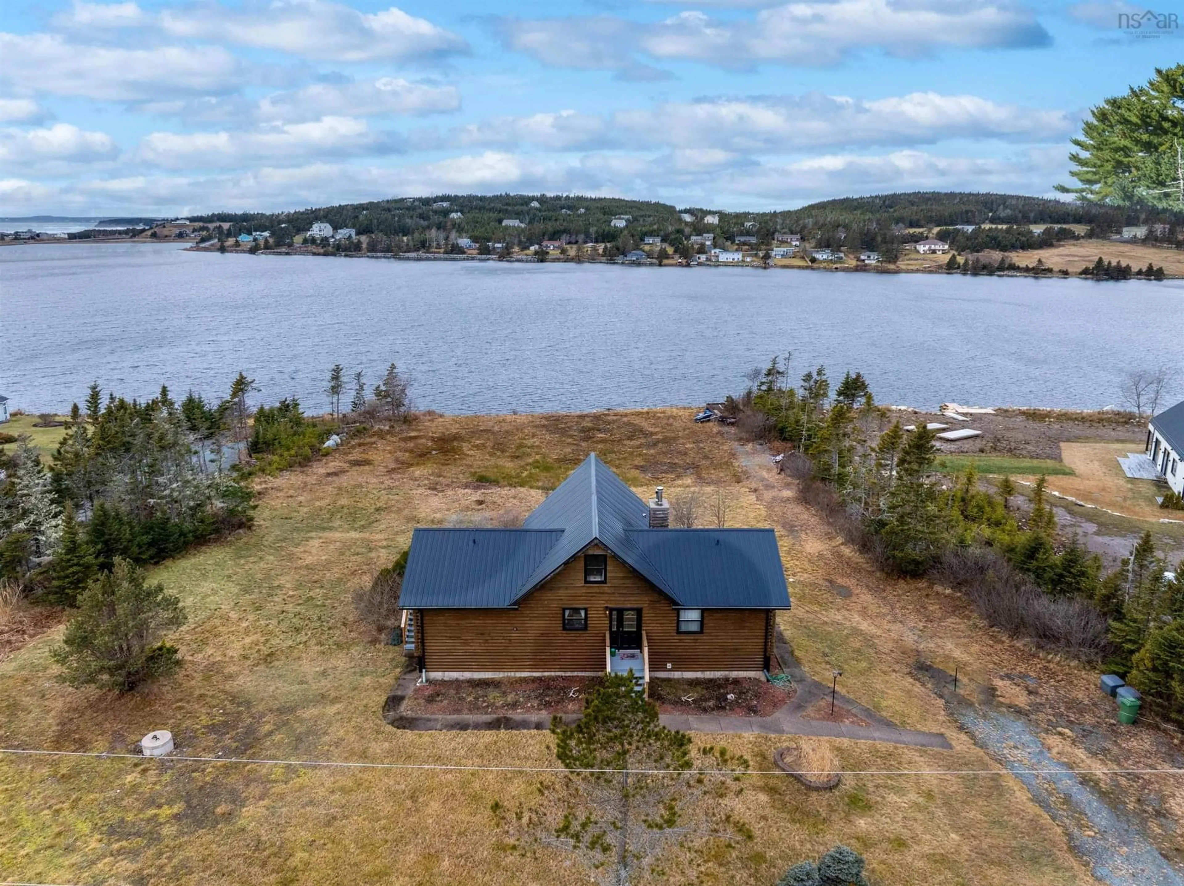 A pic from outside/outdoor area/front of a property/back of a property/a pic from drone, water/lake/river/ocean view for 20 Emerald Dr, Three Fathom Harbour Nova Scotia B0J 2L0