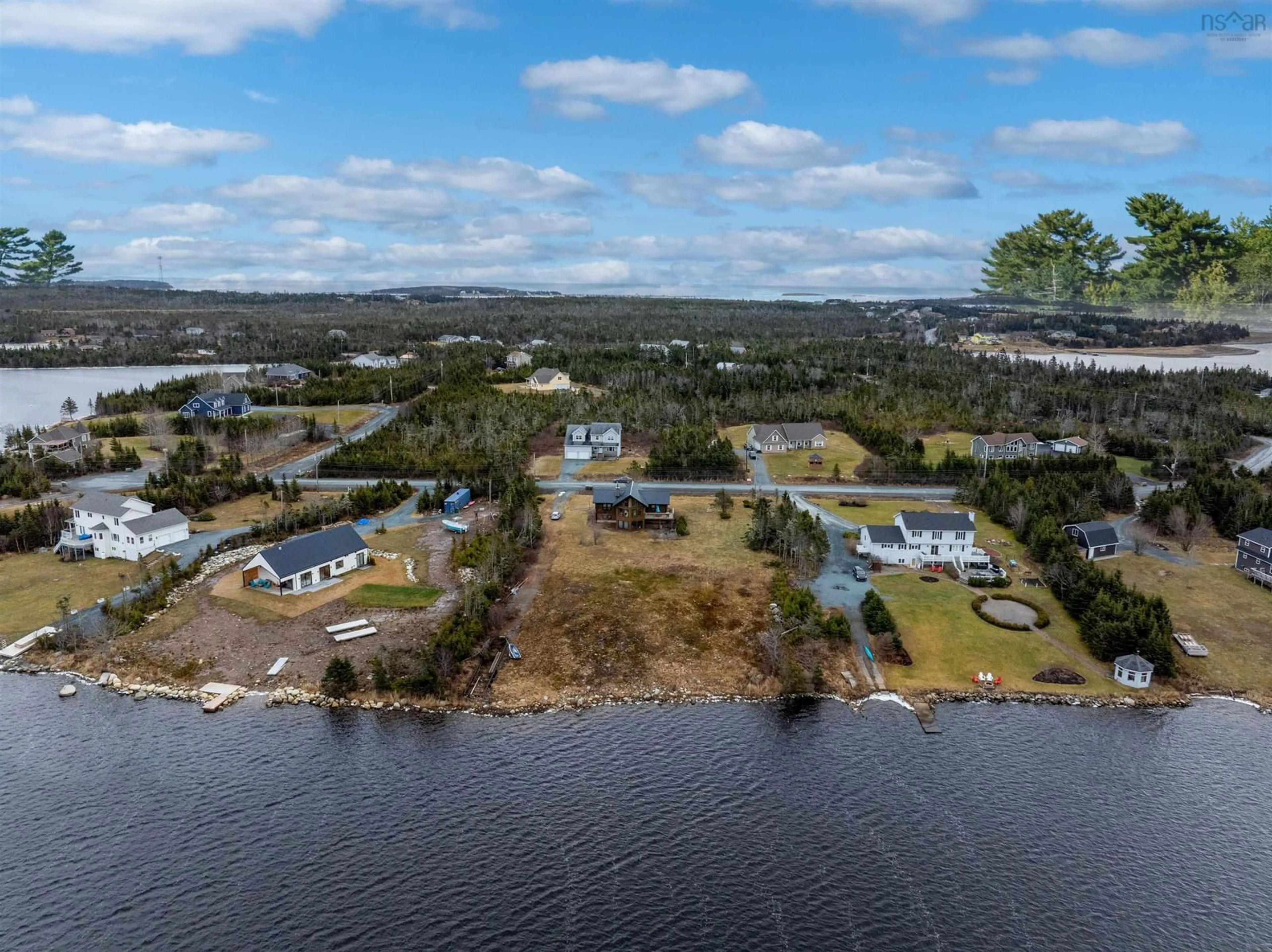 A pic from outside/outdoor area/front of a property/back of a property/a pic from drone, water/lake/river/ocean view for 20 Emerald Dr, Three Fathom Harbour Nova Scotia B0J 2L0