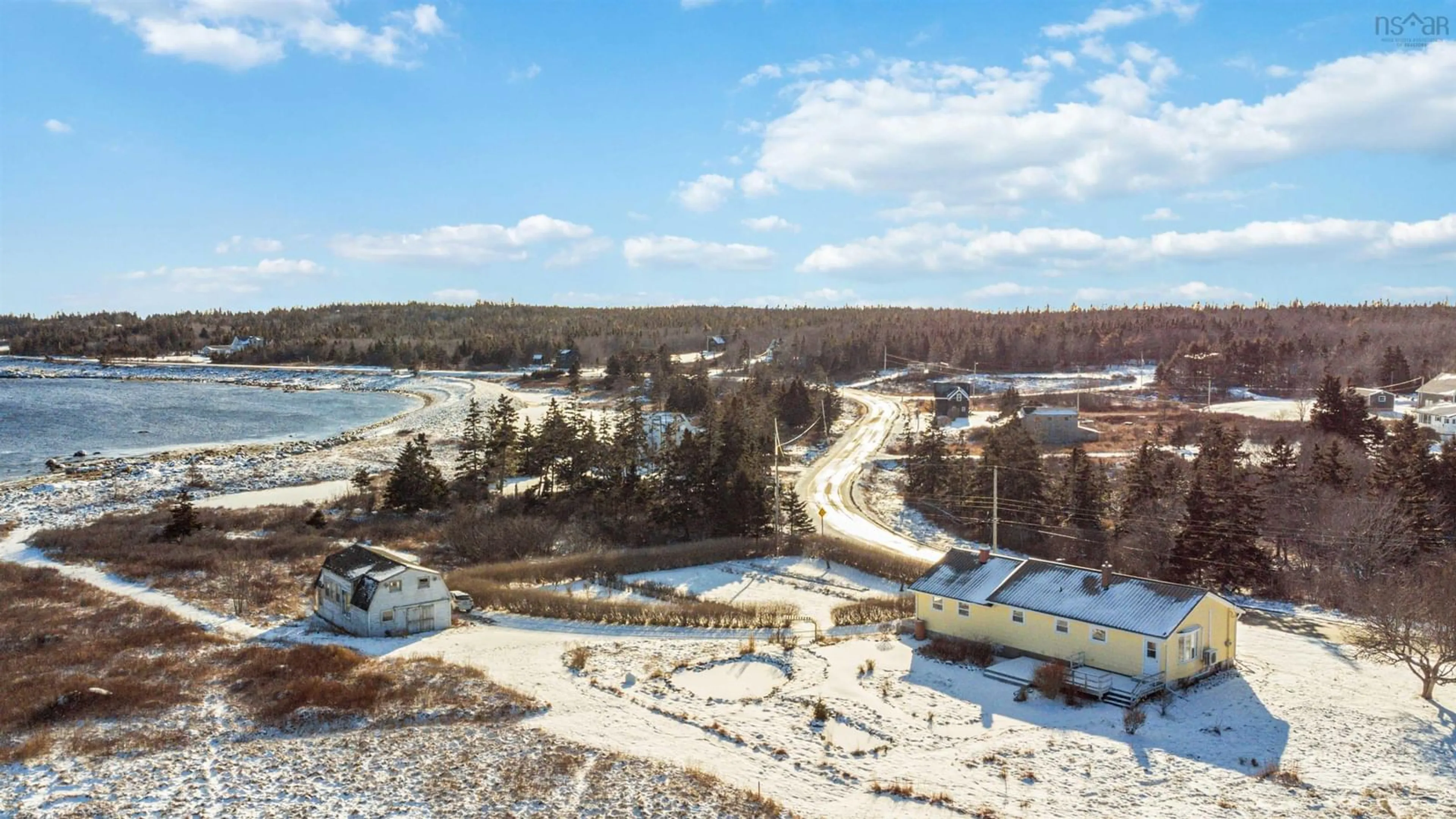 A pic from outside/outdoor area/front of a property/back of a property/a pic from drone, water/lake/river/ocean view for 1025 Shore Rd, Moose Harbour Nova Scotia B0T 1K0