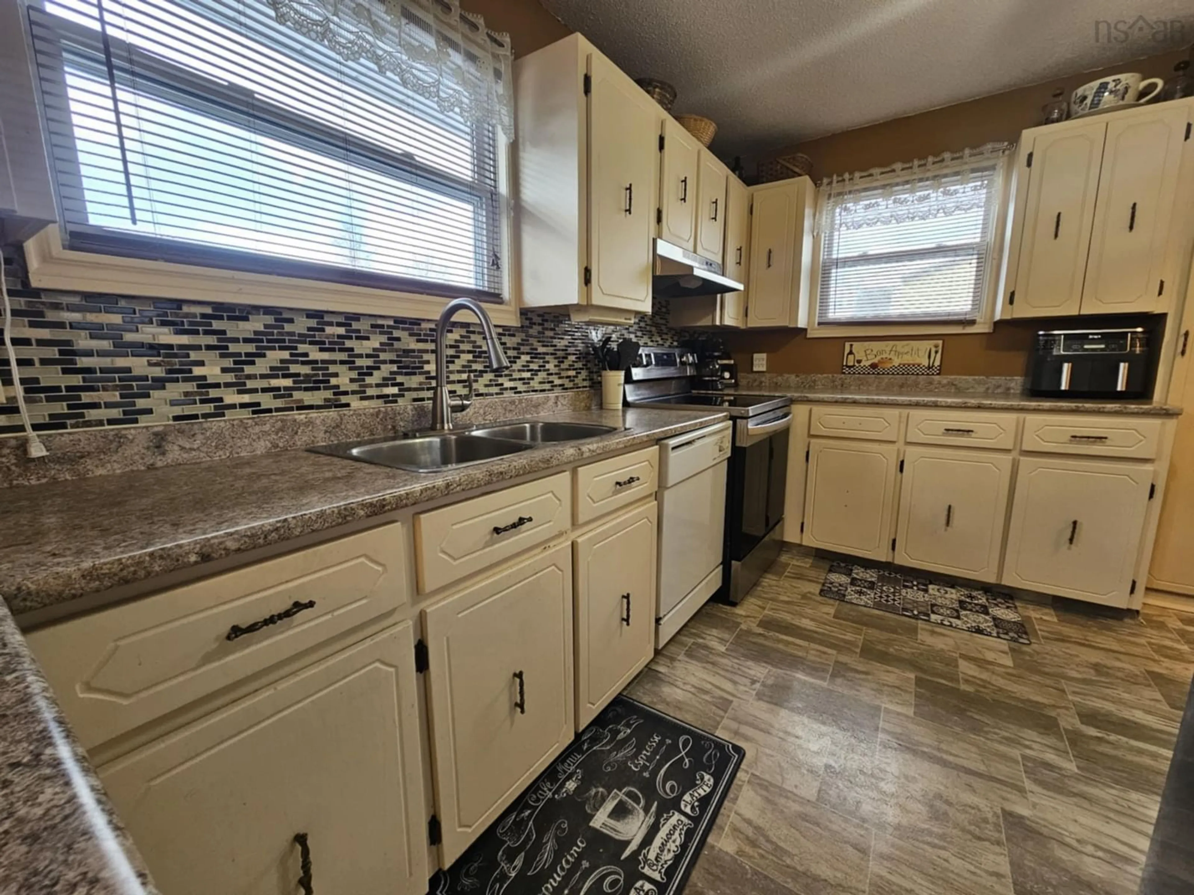 Standard kitchen, ceramic/tile floor for 39 Halliday St, Westmount Nova Scotia B1R 2A8