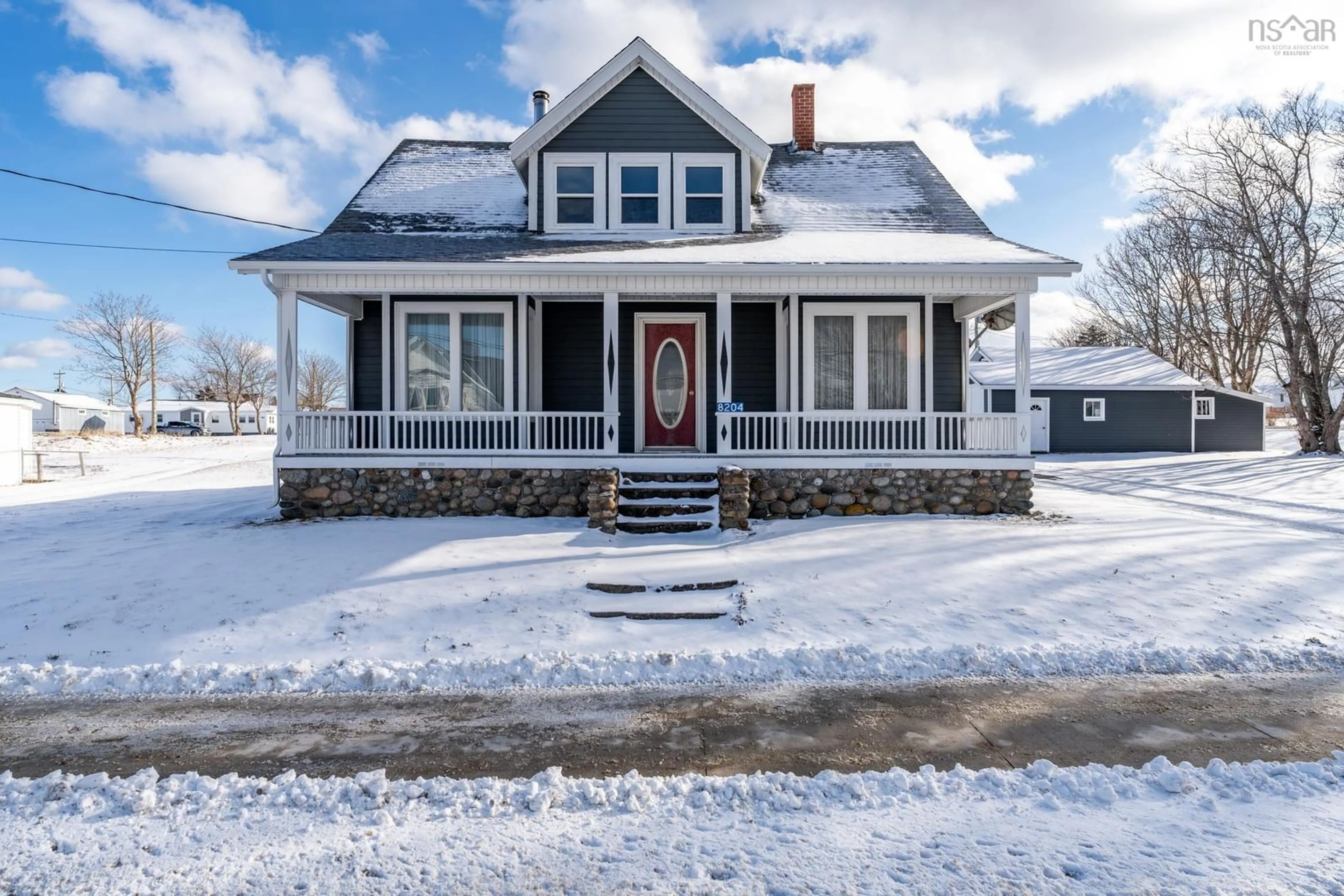 Home with vinyl exterior material, street for 8204 Highway 1, Meteghan Nova Scotia B0W 2J0