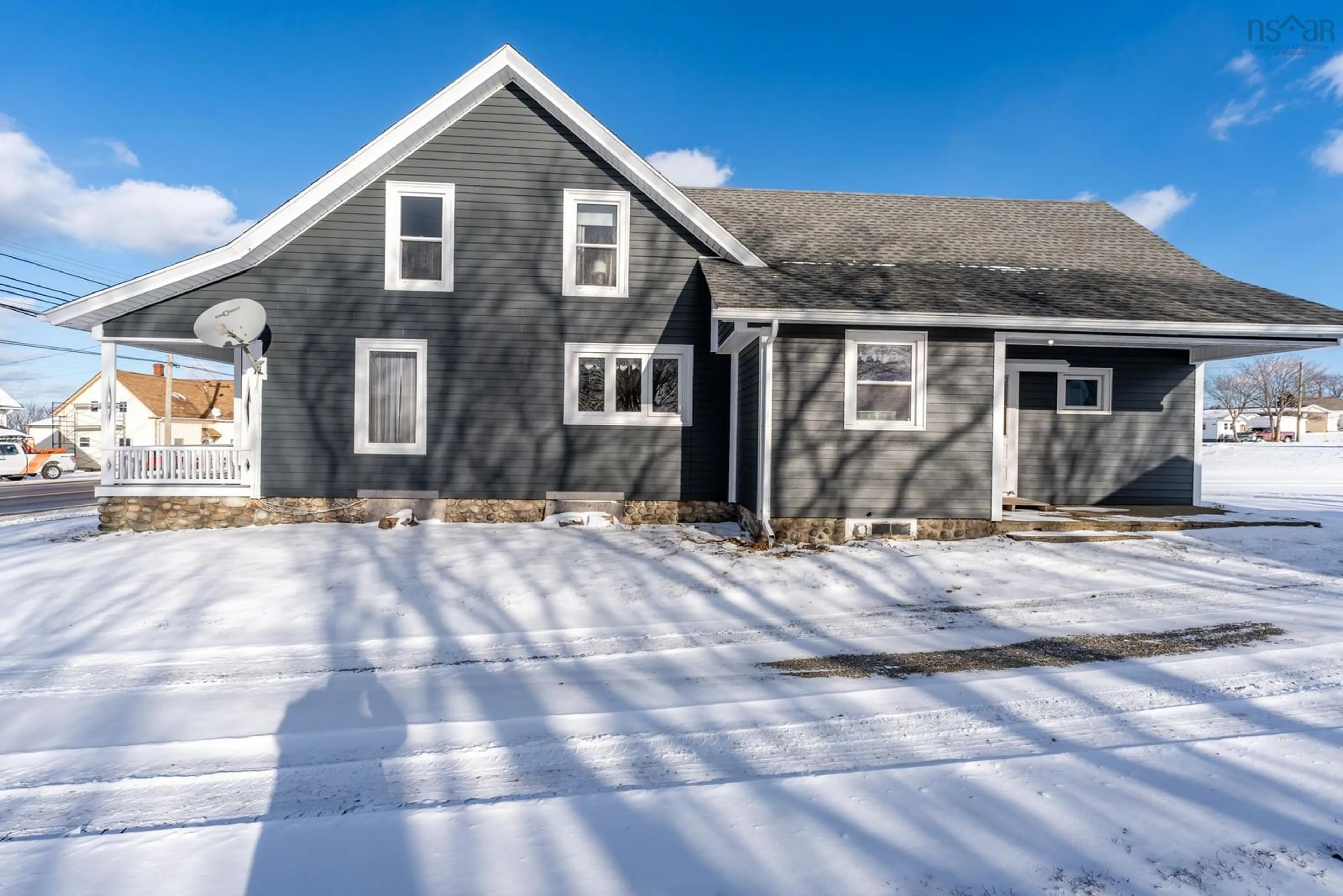 Home with vinyl exterior material, street for 8204 Highway 1, Meteghan Nova Scotia B0W 2J0