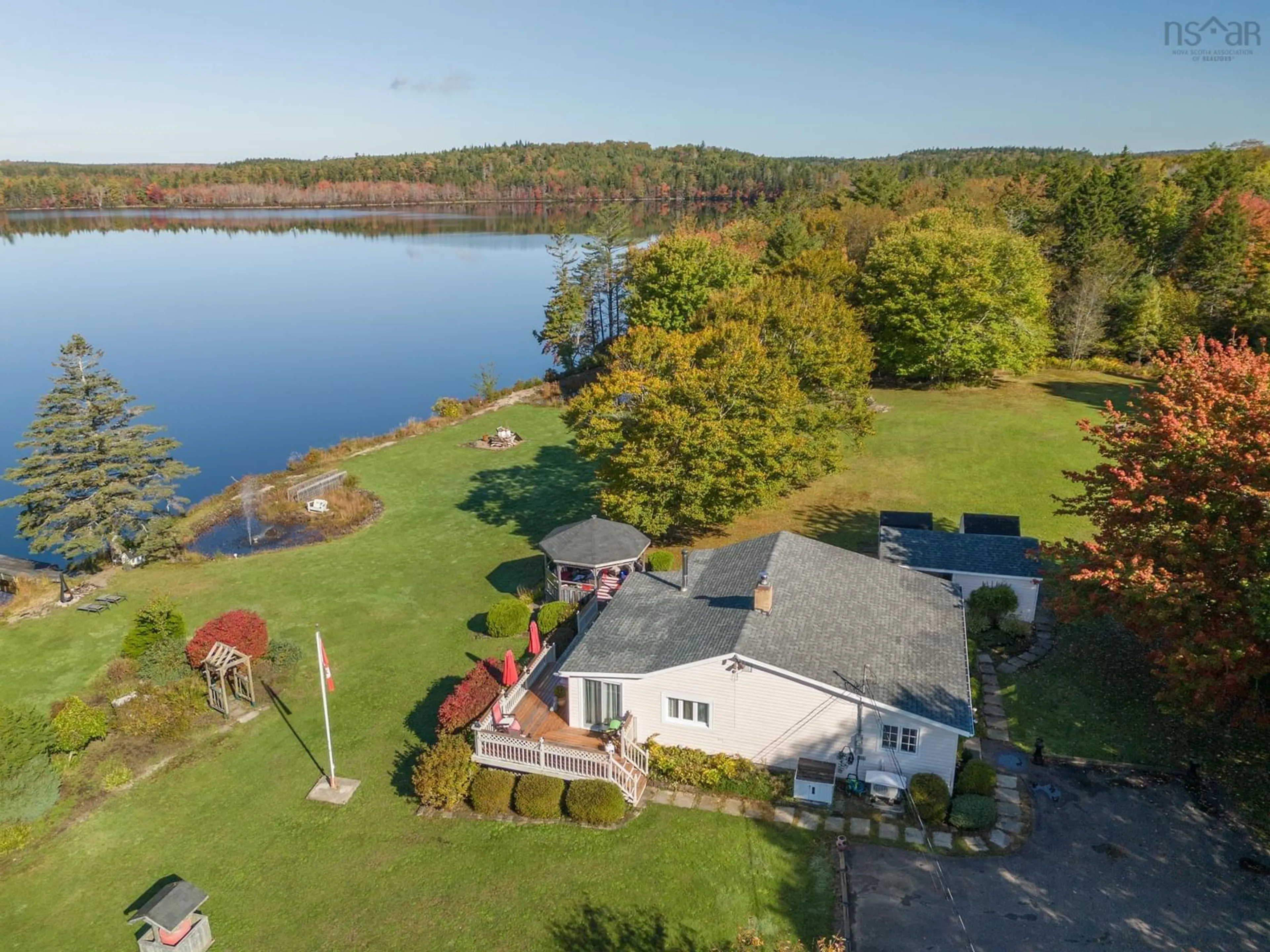 A pic from outside/outdoor area/front of a property/back of a property/a pic from drone, water/lake/river/ocean view for 5639 Highway 308, Bell Neck Nova Scotia B0W 3M0