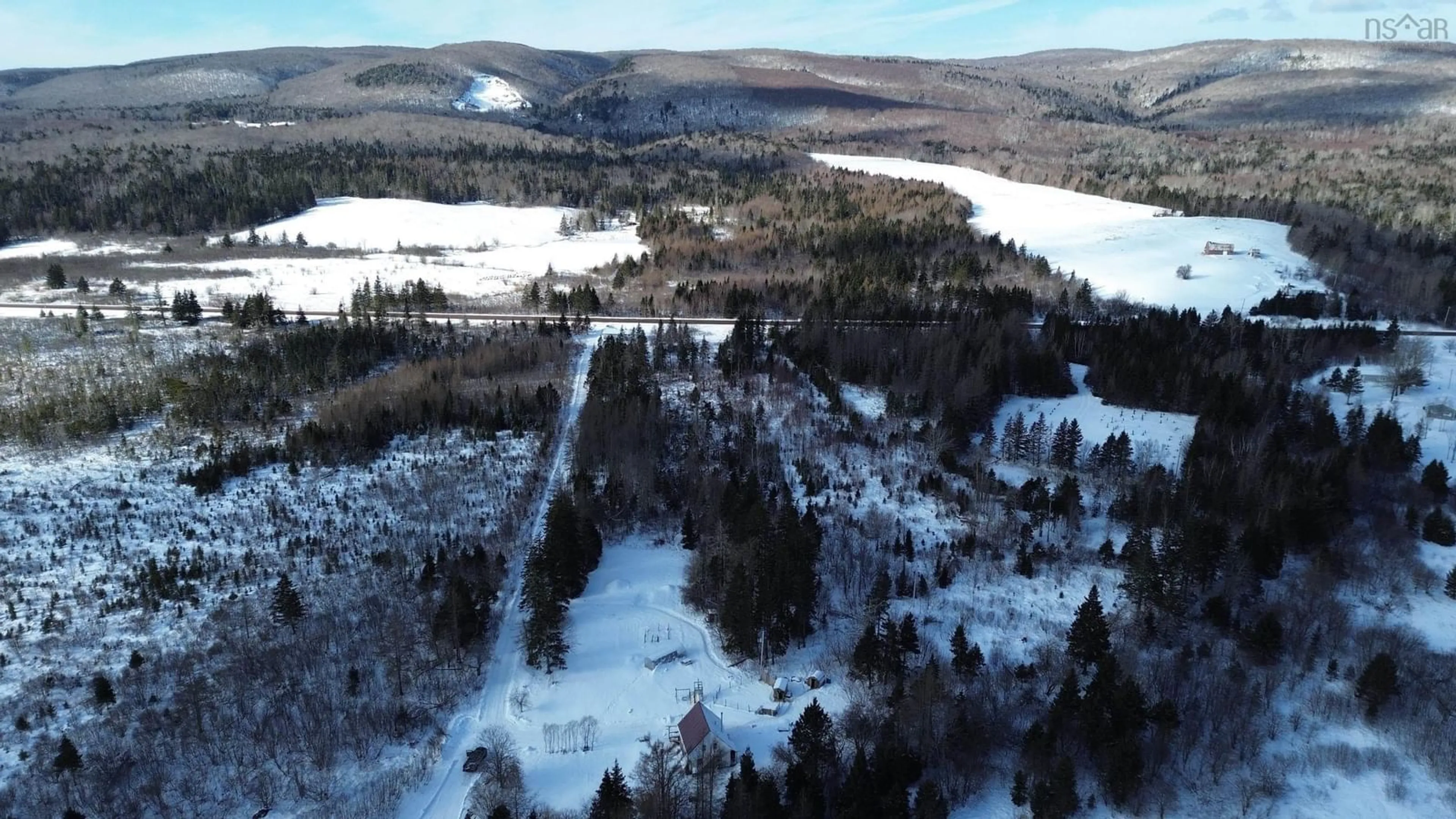 A pic from outside/outdoor area/front of a property/back of a property/a pic from drone, mountain view for 6760 Highway 105, Upper River Denys Nova Scotia B0E 3M0