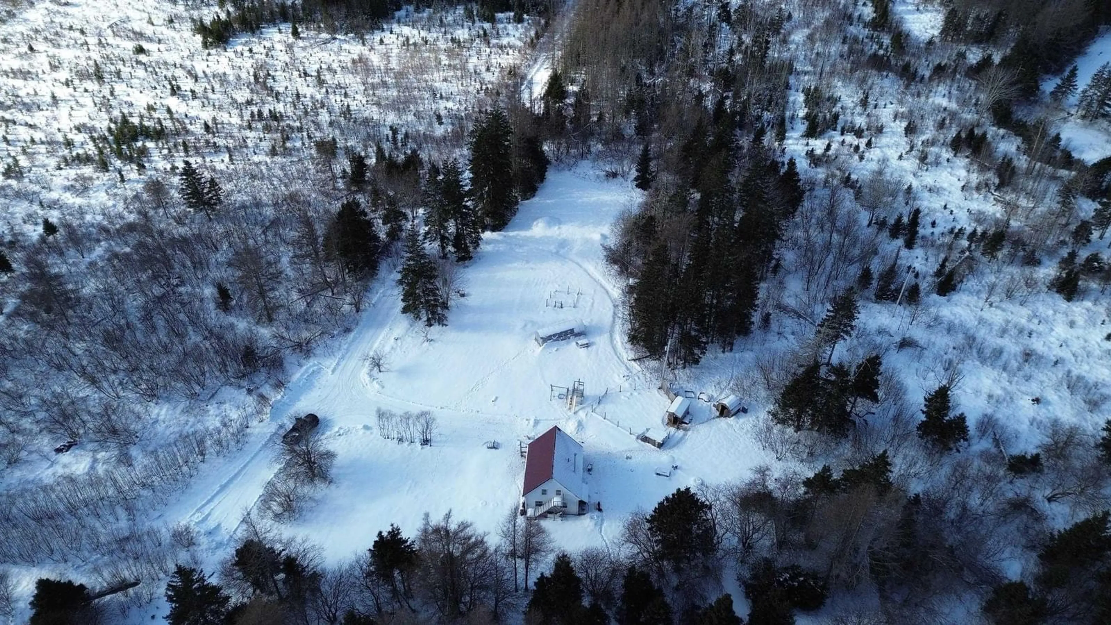 A pic from outside/outdoor area/front of a property/back of a property/a pic from drone, unknown for 6760 Highway 105, Upper River Denys Nova Scotia B0E 3M0