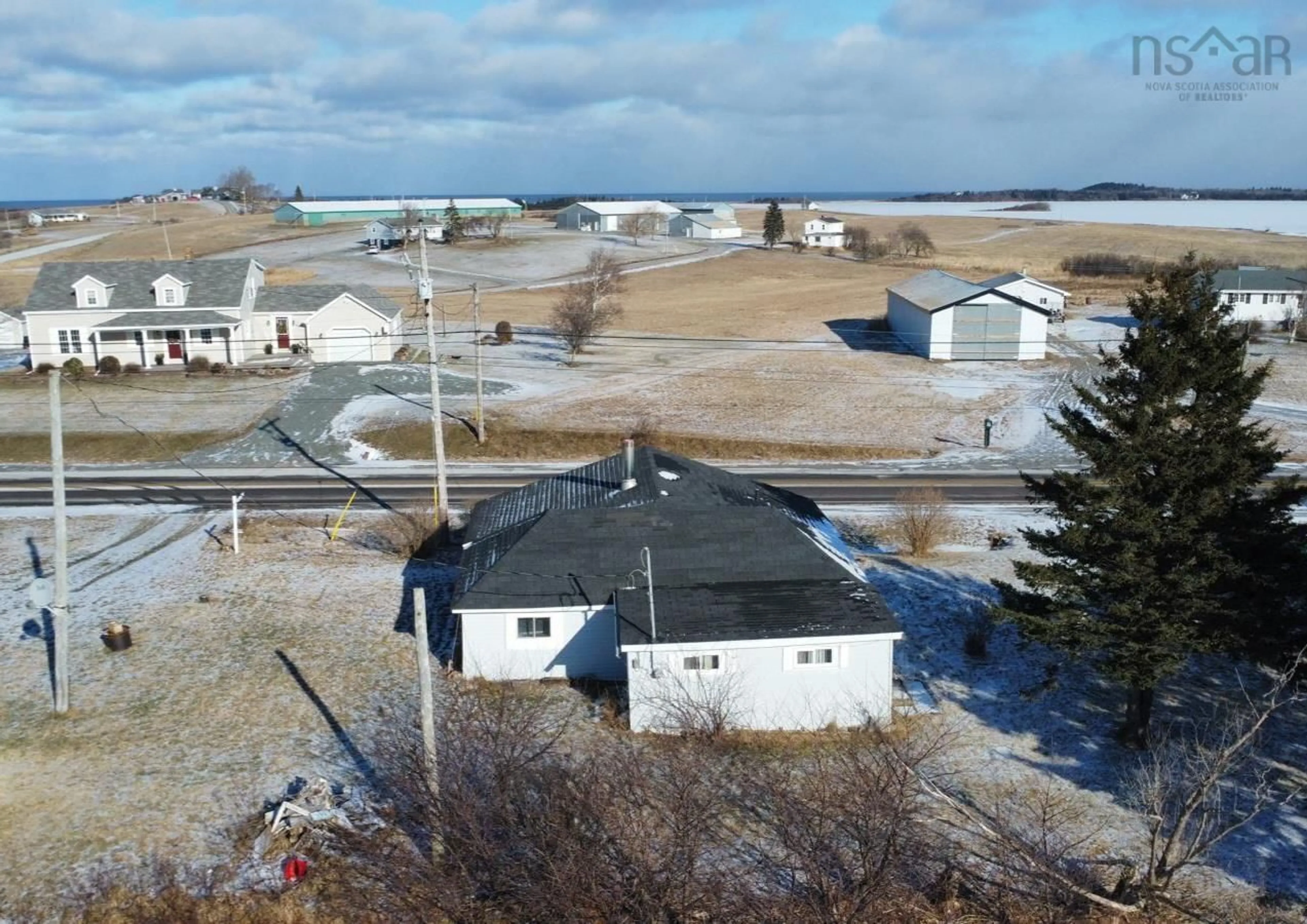 A pic from outside/outdoor area/front of a property/back of a property/a pic from drone, unknown for 9356 Highway 4, Tracadie Nova Scotia B0H 1A0