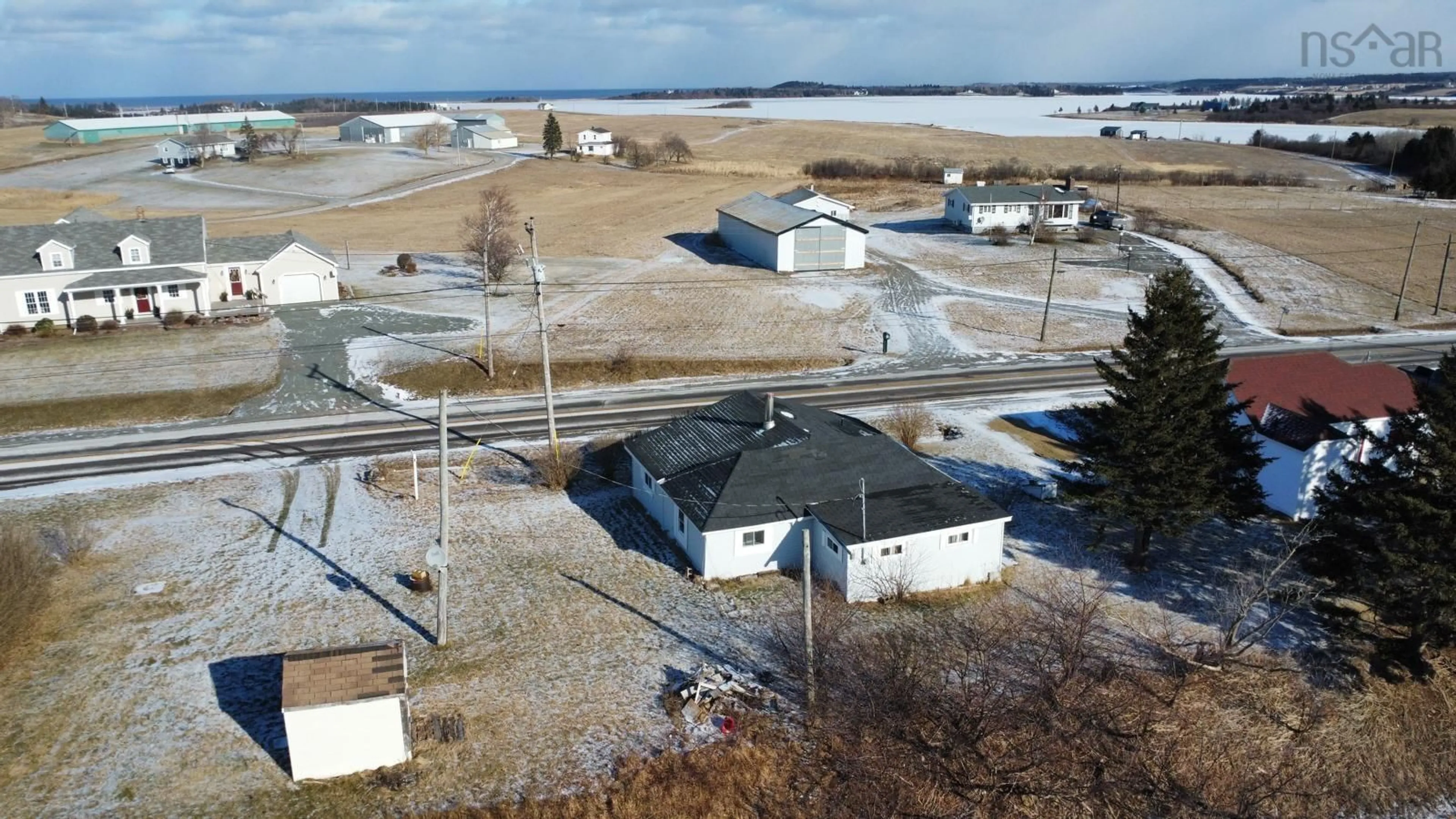 A pic from outside/outdoor area/front of a property/back of a property/a pic from drone, unknown for 9356 Highway 4, Tracadie Nova Scotia B0H 1A0