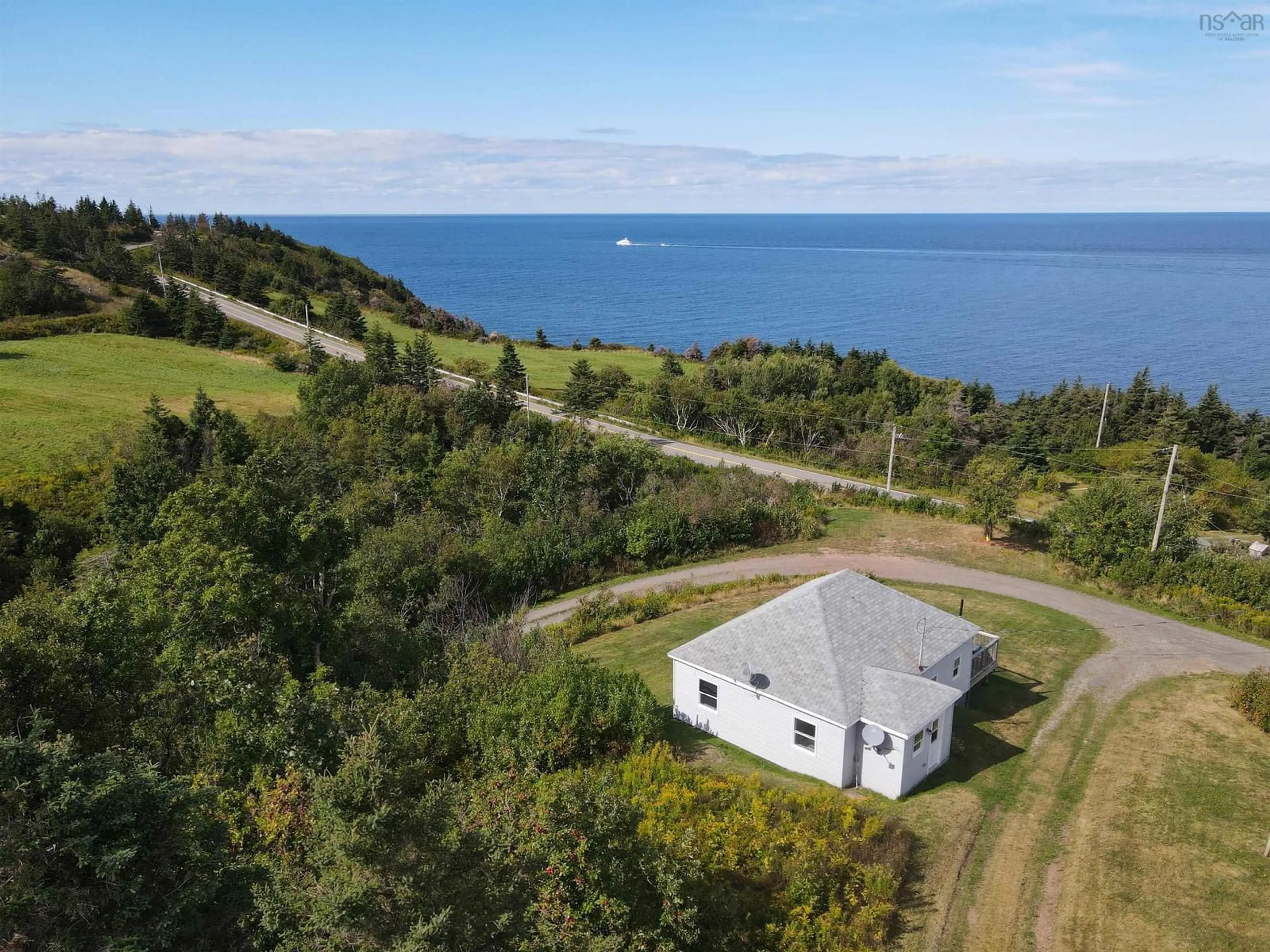 A pic from outside/outdoor area/front of a property/back of a property/a pic from drone, water/lake/river/ocean view for 27 Old School Loop, Cape George Point Nova Scotia B2G 2L2