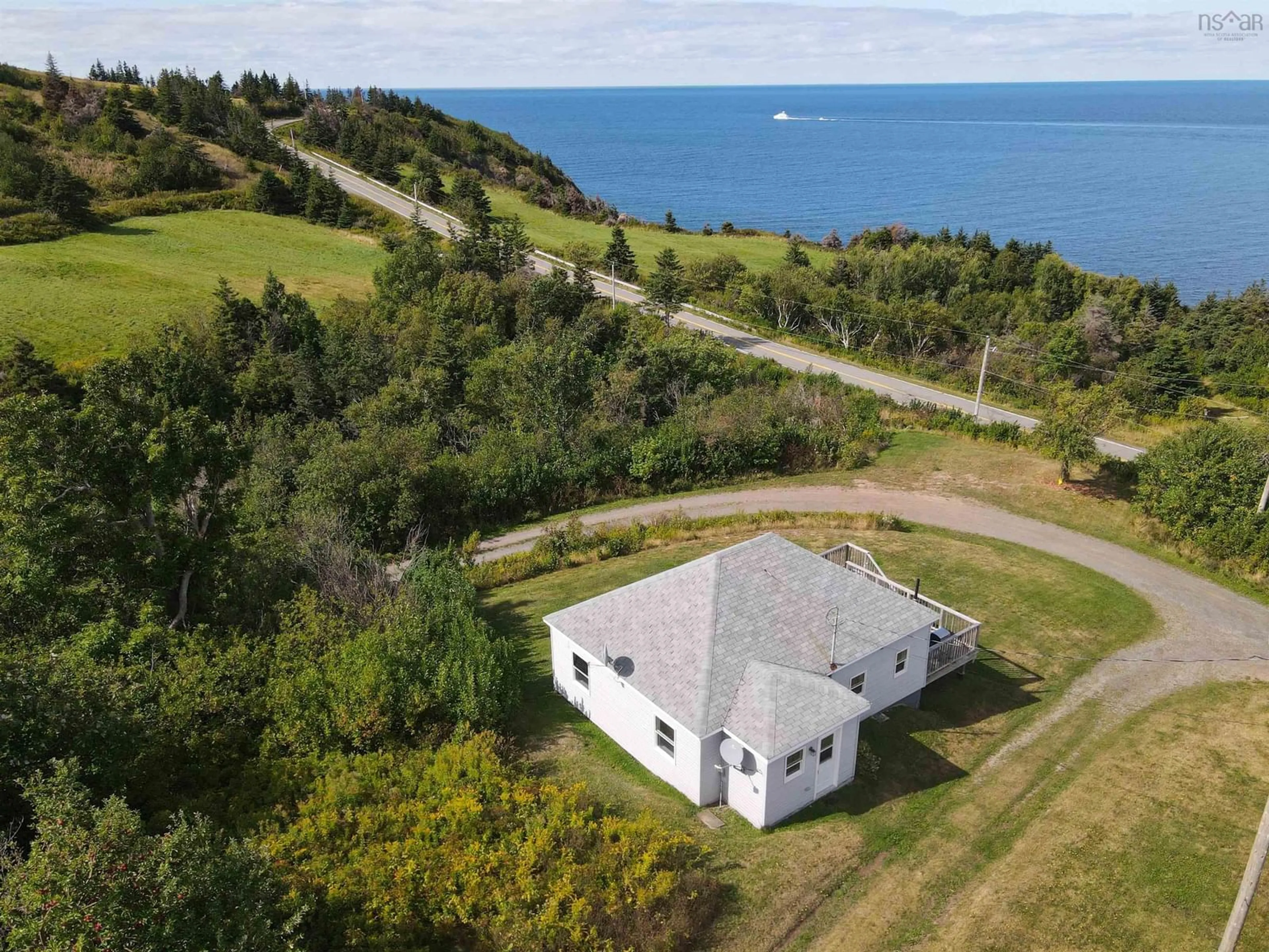 A pic from outside/outdoor area/front of a property/back of a property/a pic from drone, water/lake/river/ocean view for 27 Old School Loop, Cape George Point Nova Scotia B2G 2L2