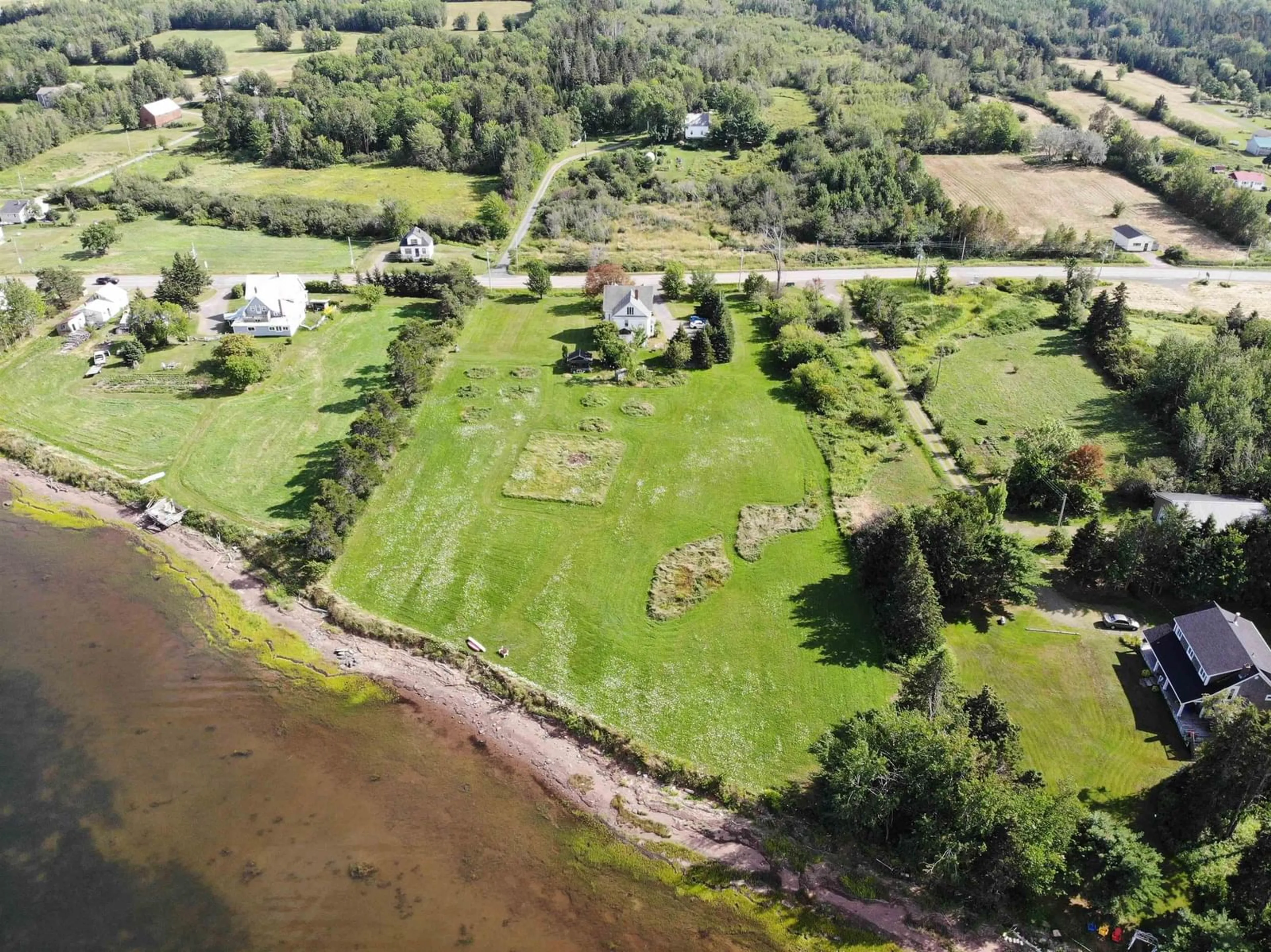 A pic from outside/outdoor area/front of a property/back of a property/a pic from drone, water/lake/river/ocean view for 13769 Highway 6, Wallace Nova Scotia B0K 1Y0