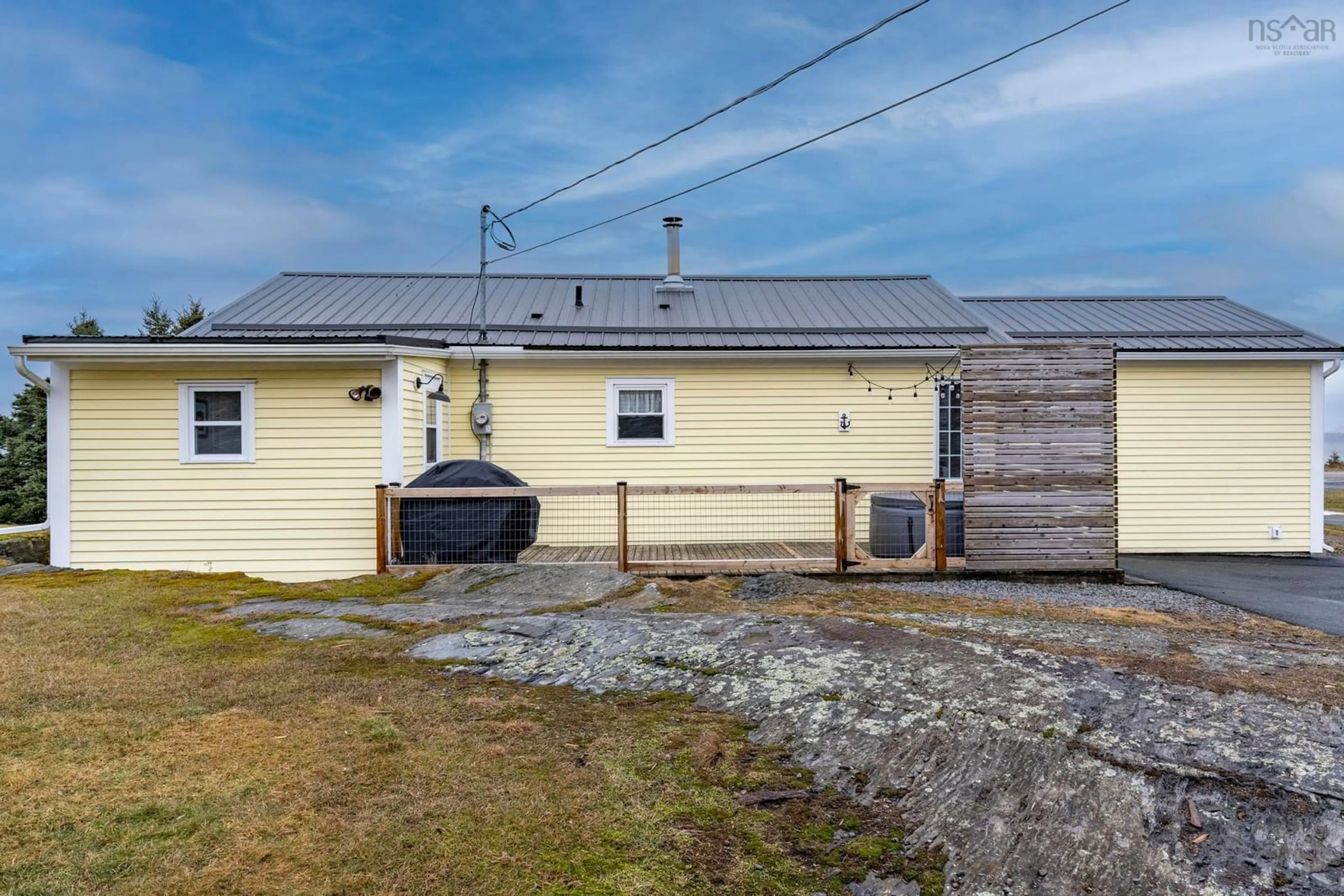 A pic from outside/outdoor area/front of a property/back of a property/a pic from drone, street for 1263 Blue Rocks Rd, Blue Rocks Nova Scotia B0J 2C0