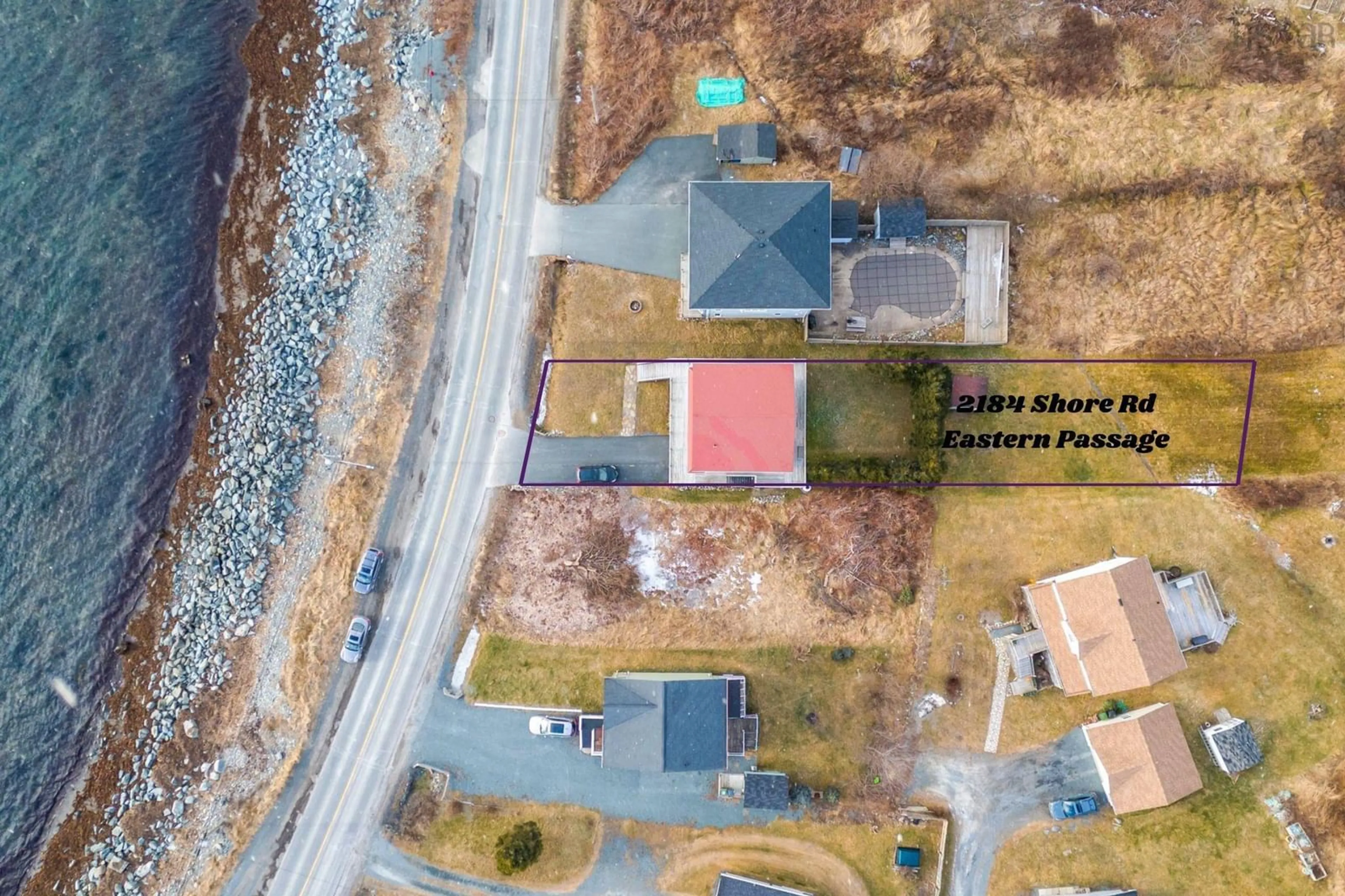 A pic from outside/outdoor area/front of a property/back of a property/a pic from drone, unknown for 2184 Shore Rd, Eastern Passage Nova Scotia B3G 1H8