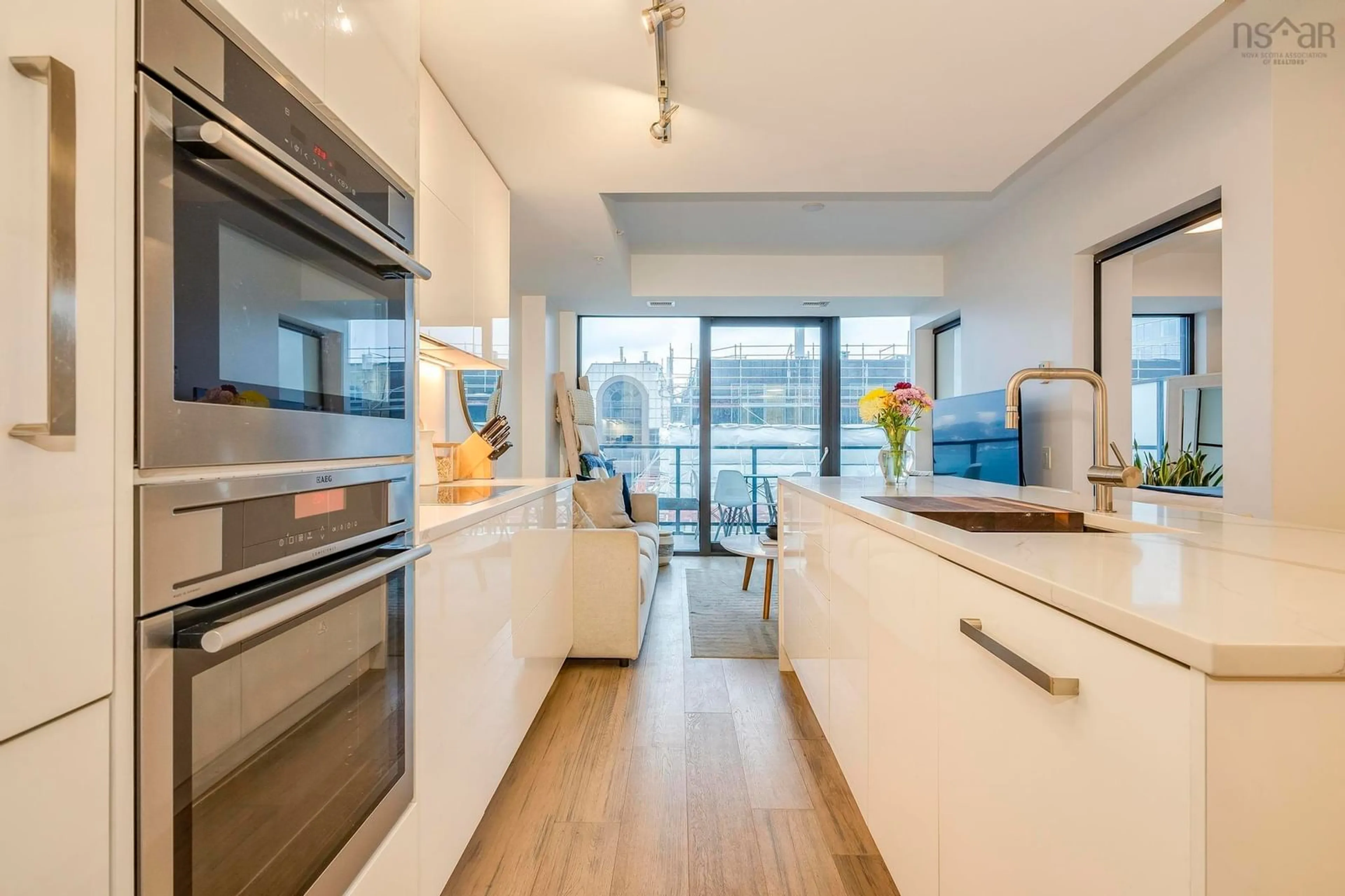 Open concept kitchen, wood/laminate floor for 1650 Granville St #1404, Halifax Nova Scotia B3J 0E1