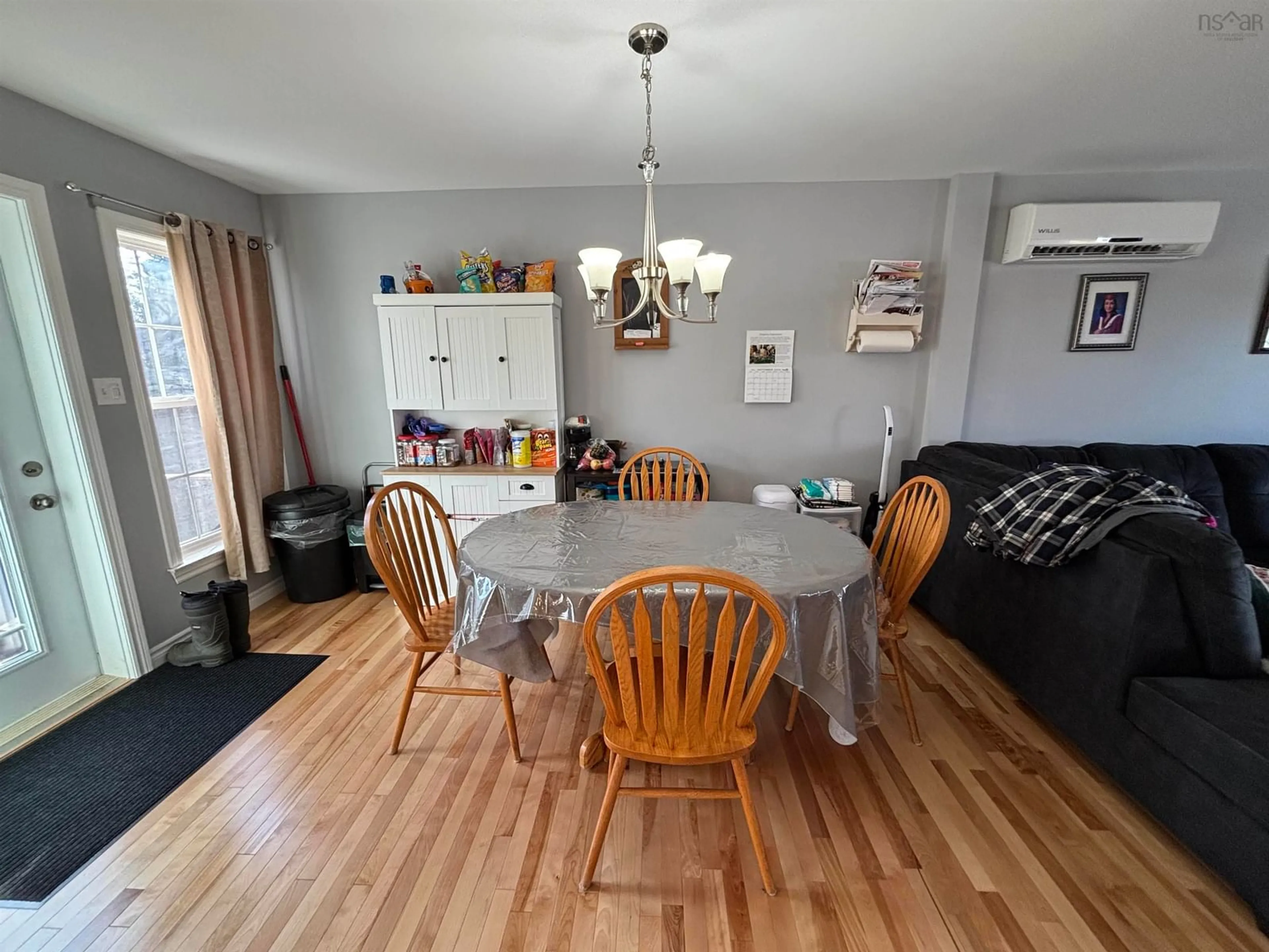 Dining room, wood/laminate floor for 26 David St, Lower South River Nova Scotia B2G 0B4