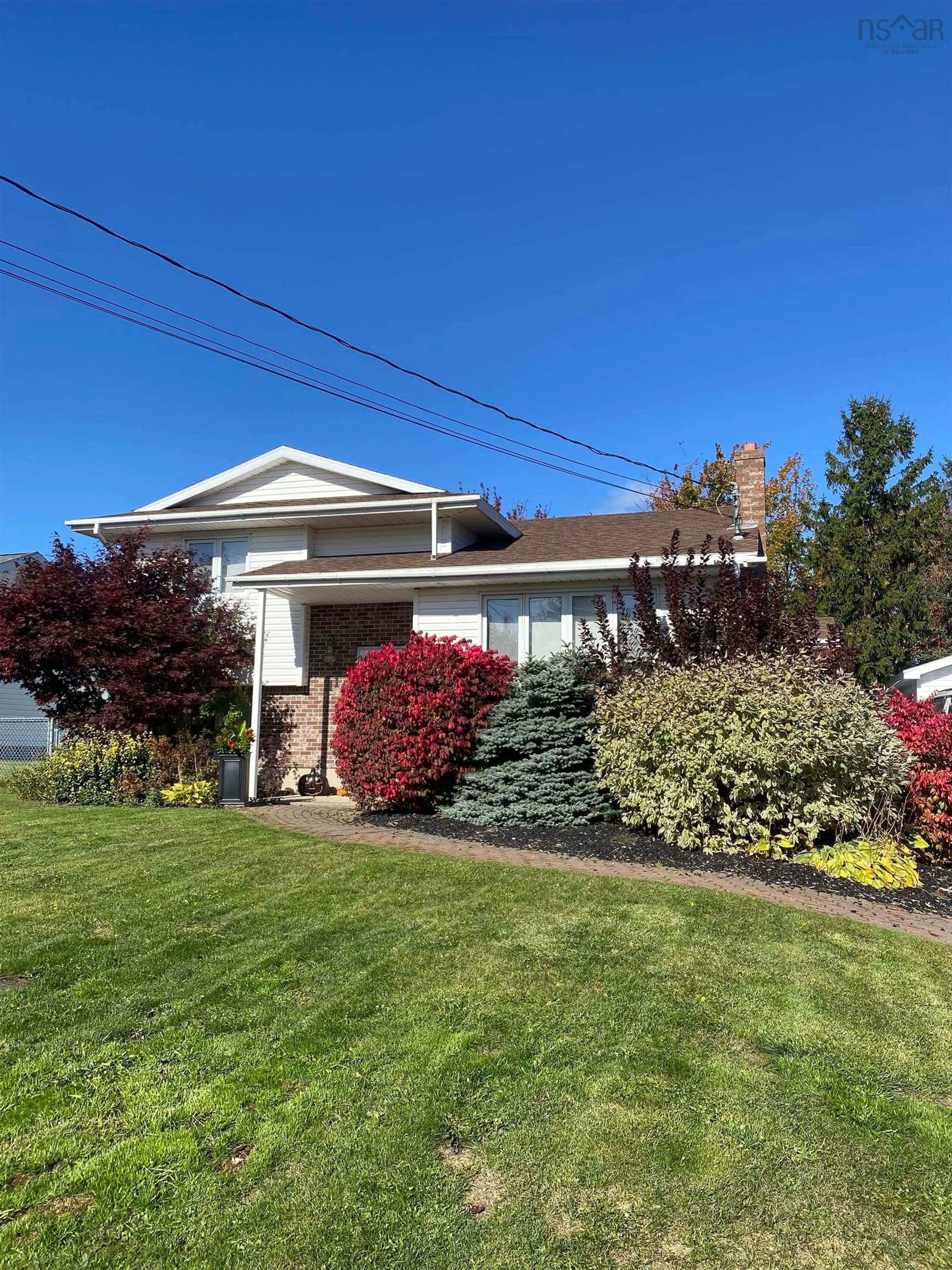 Home with vinyl exterior material, street for 11 Miles Avenue, North Sydney Nova Scotia B2A 3W8