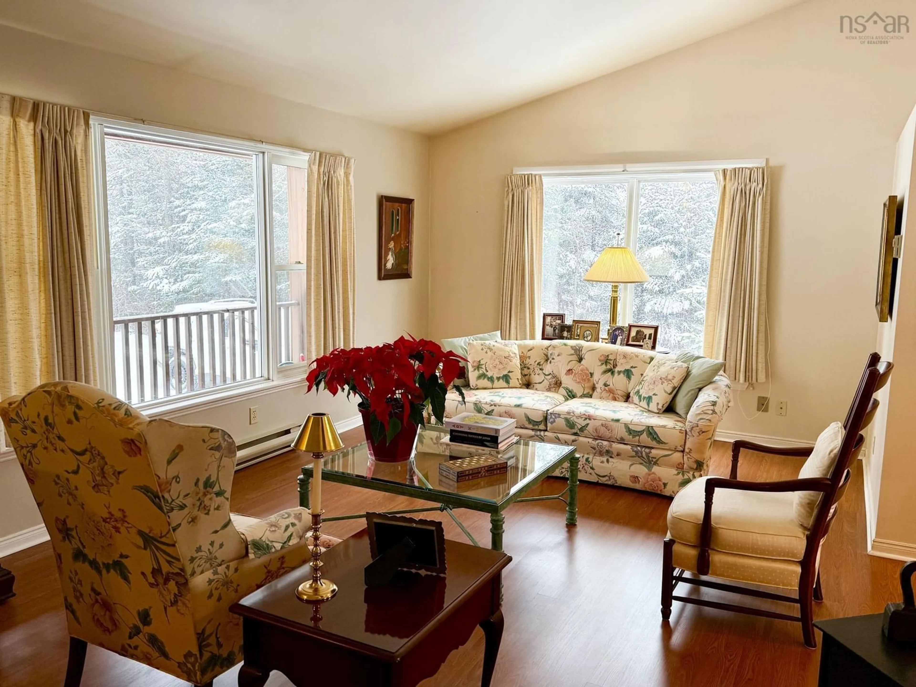 Living room with furniture, wood/laminate floor for 110 Bonavista Ave, Hilden Nova Scotia B0N 1C0