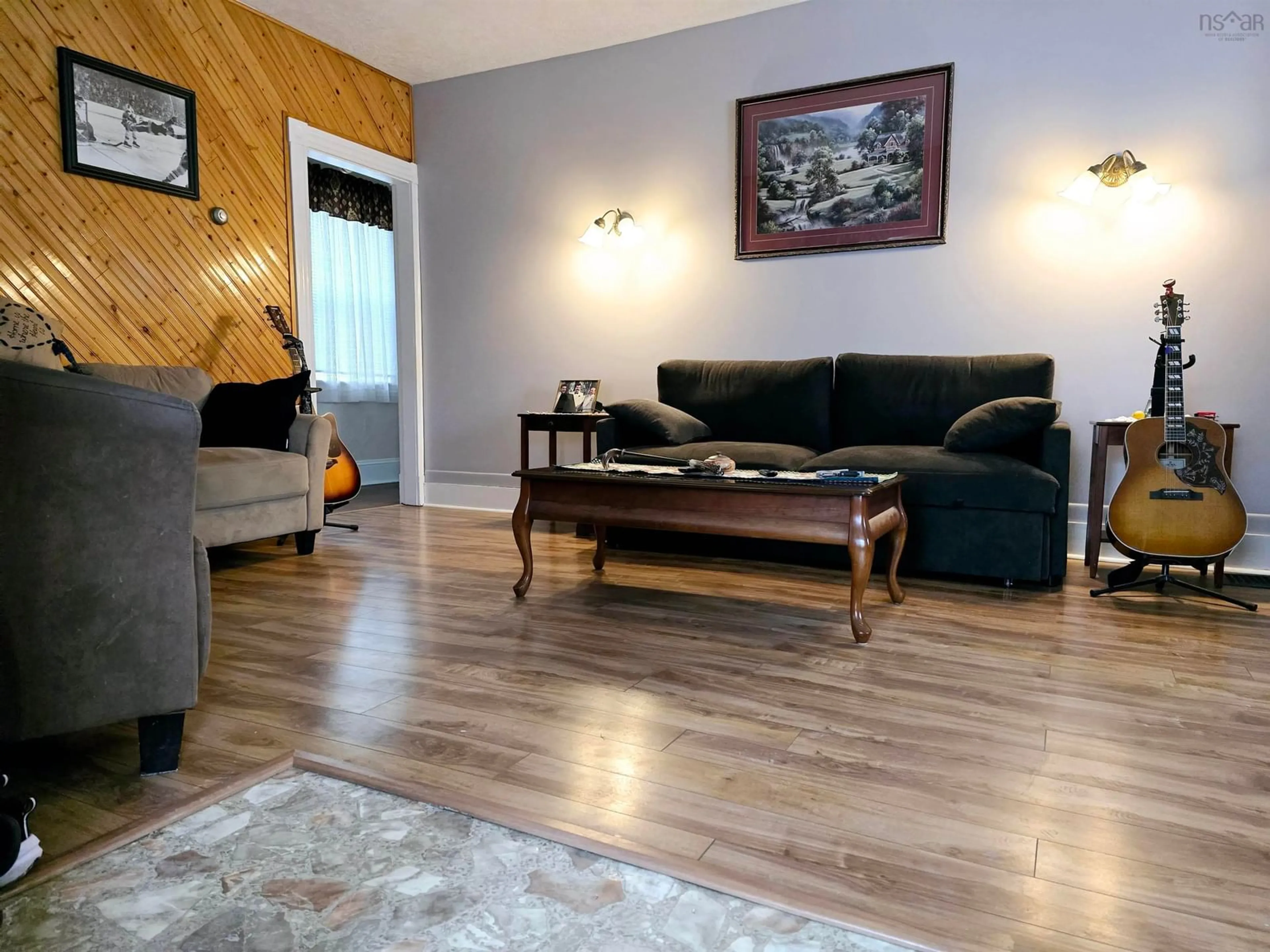 Living room with furniture, wood/laminate floor for 14 Seventh St, Trenton Nova Scotia B0K 1X0