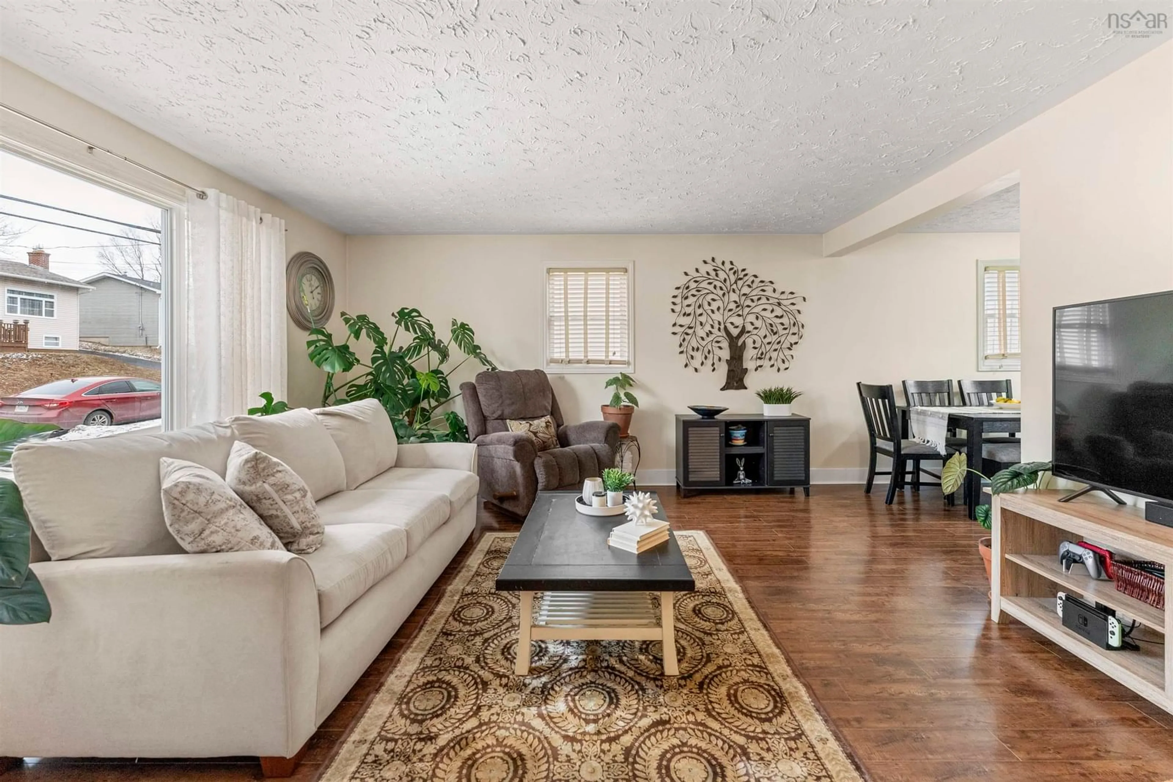 Living room with furniture, wood/laminate floor for 230 Stokil Dr, Lower Sackville Nova Scotia B4C 3C3