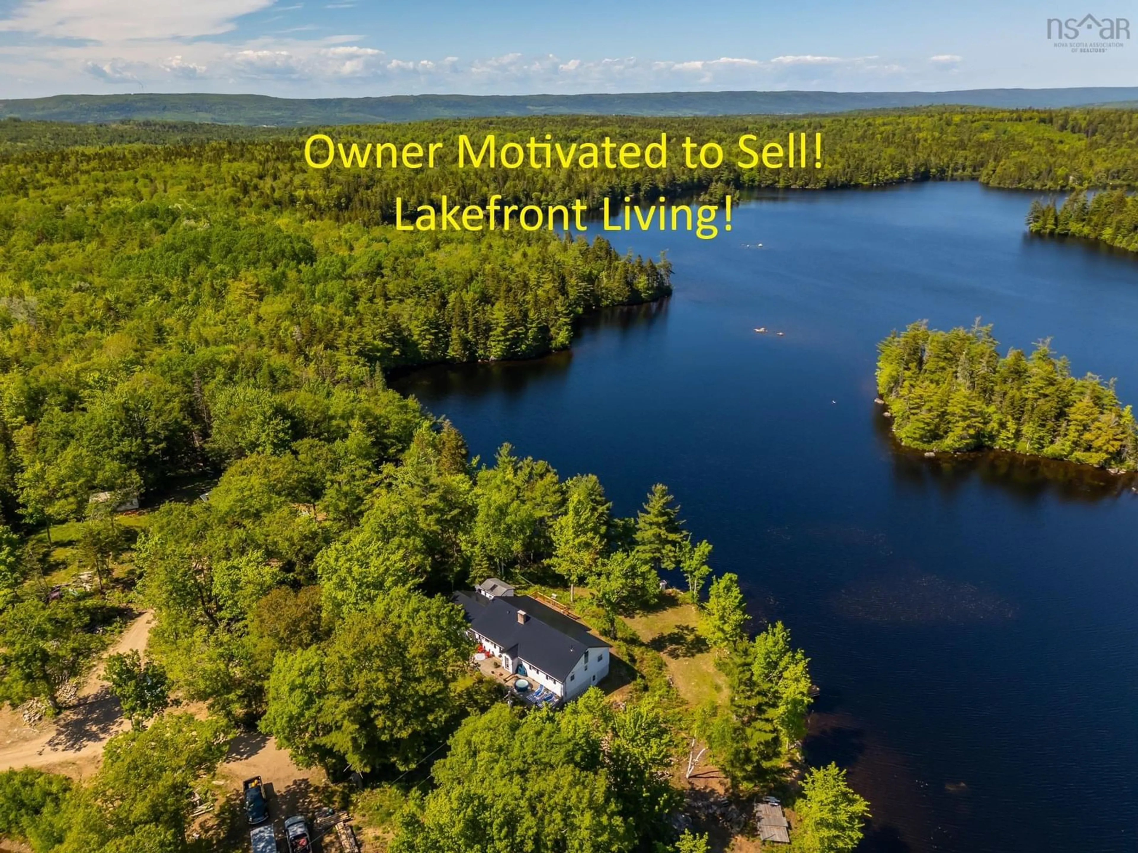 A pic from outside/outdoor area/front of a property/back of a property/a pic from drone, water/lake/river/ocean view for 31 Acorn Lane, Lake La Rose Nova Scotia B0S 1A0