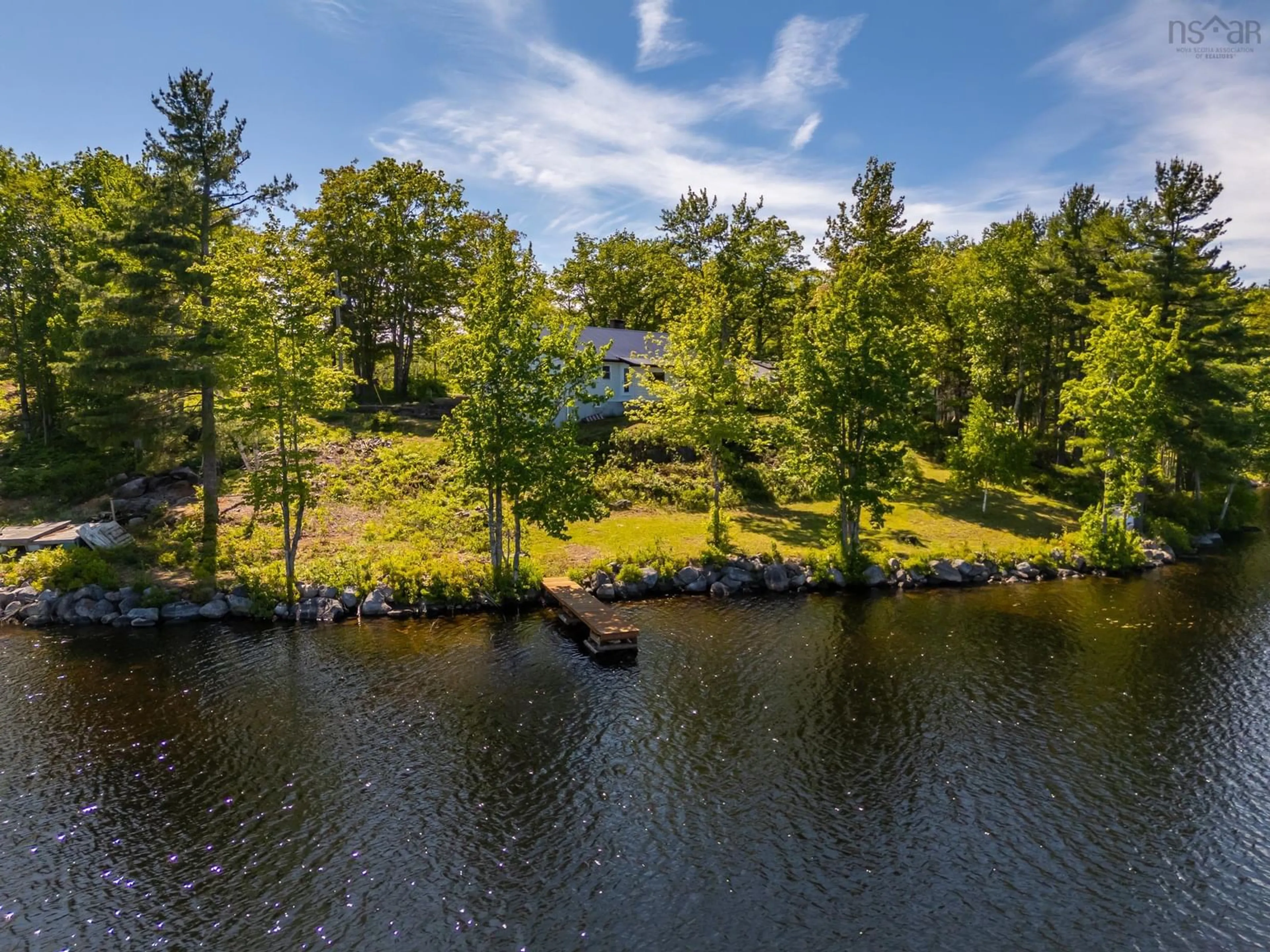 A pic from outside/outdoor area/front of a property/back of a property/a pic from drone, water/lake/river/ocean view for 31 Acorn Lane, Lake La Rose Nova Scotia B0S 1A0