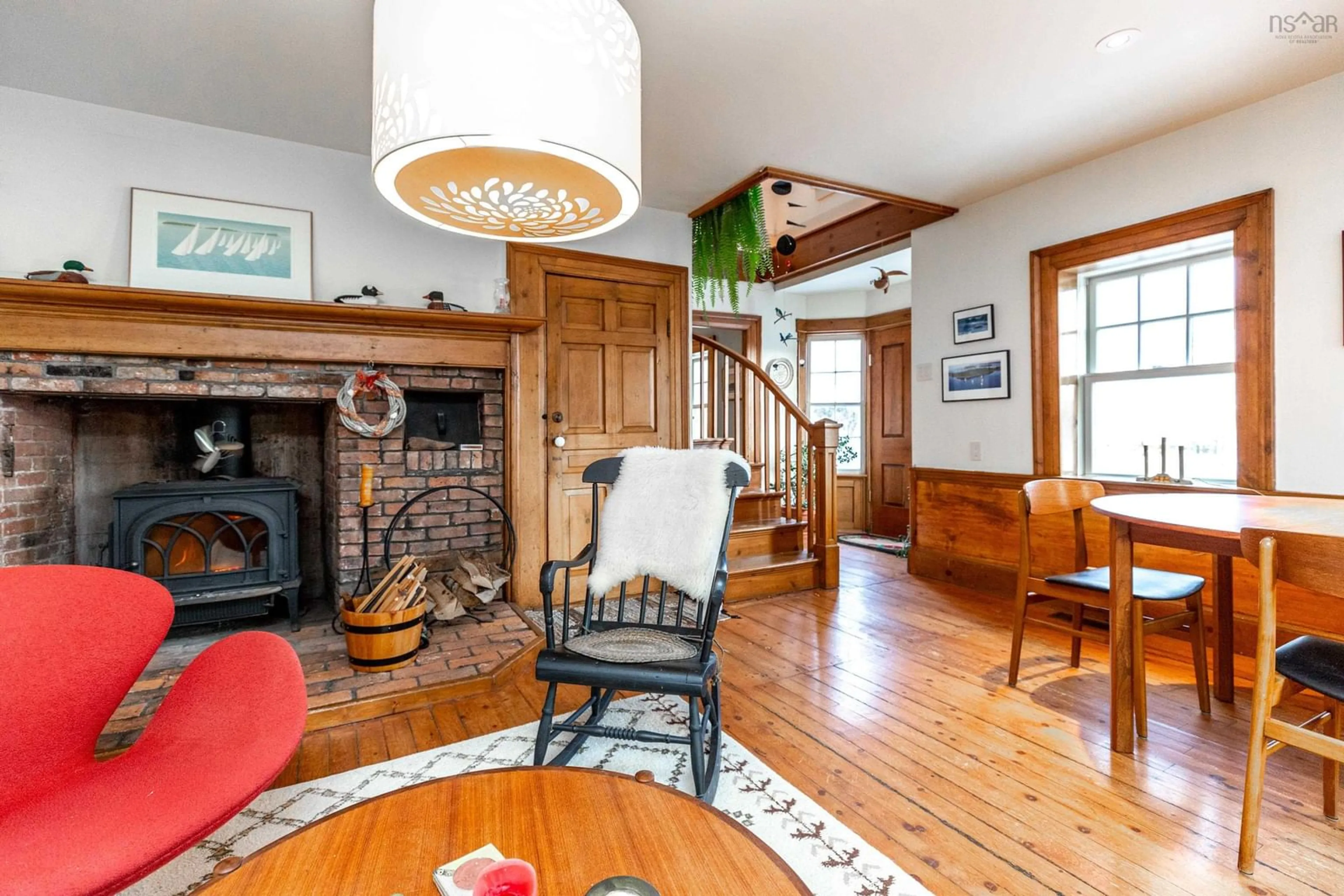 Living room with furniture, wood/laminate floor for 26 Maders Cove Rd, Maders Cove Nova Scotia B0J 2E0