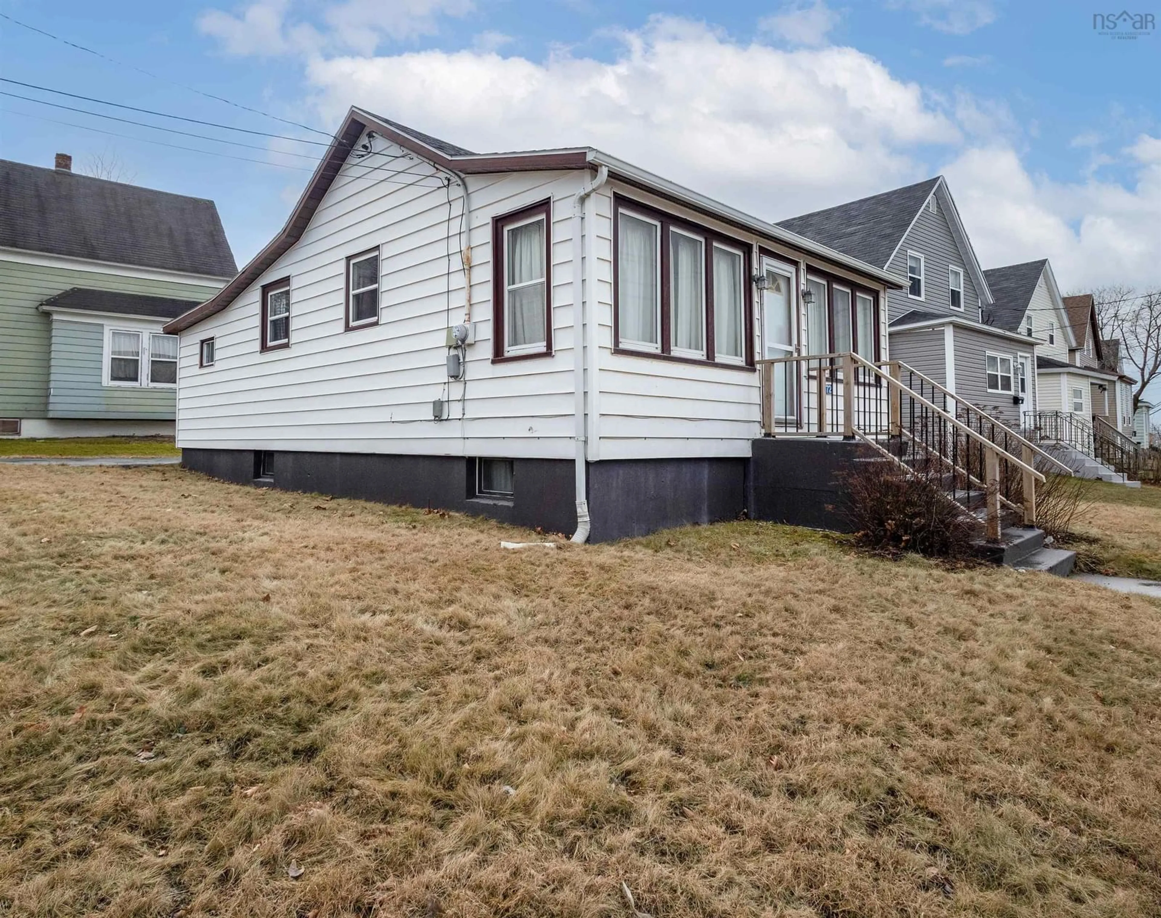 Home with vinyl exterior material, street for 72 Welton St, Sydney Nova Scotia B1P 5R2