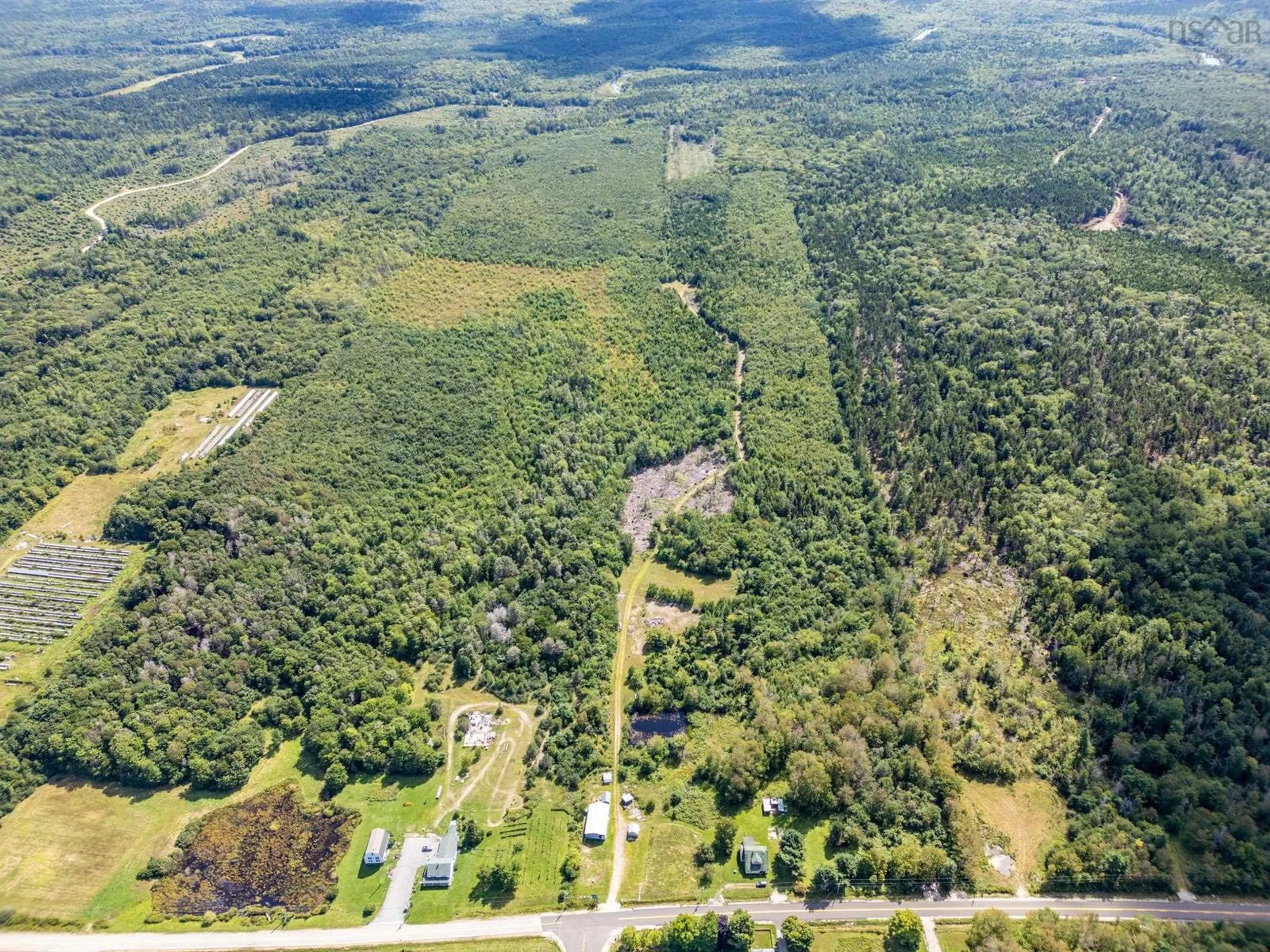 A pic from outside/outdoor area/front of a property/back of a property/a pic from drone, forest/trees view for 2780 Highway 340, Corberrie Nova Scotia B0W 3T0