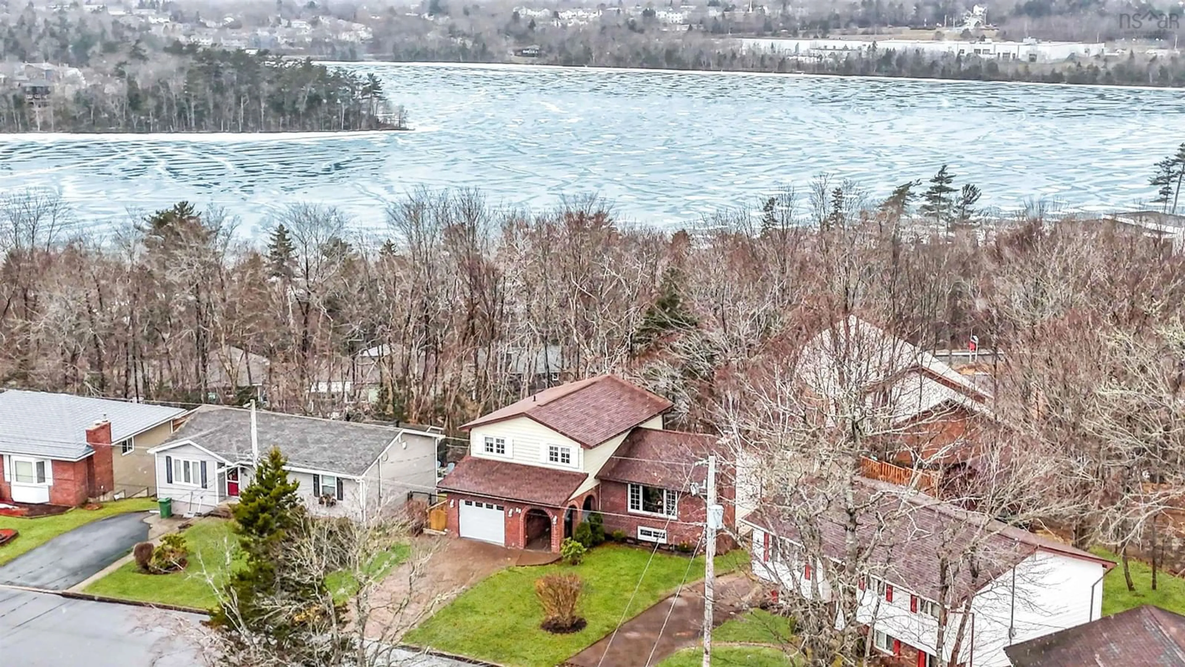 A pic from outside/outdoor area/front of a property/back of a property/a pic from drone, water/lake/river/ocean view for 88 Cavendish Dr, Lower Sackville Nova Scotia B4C 3K1