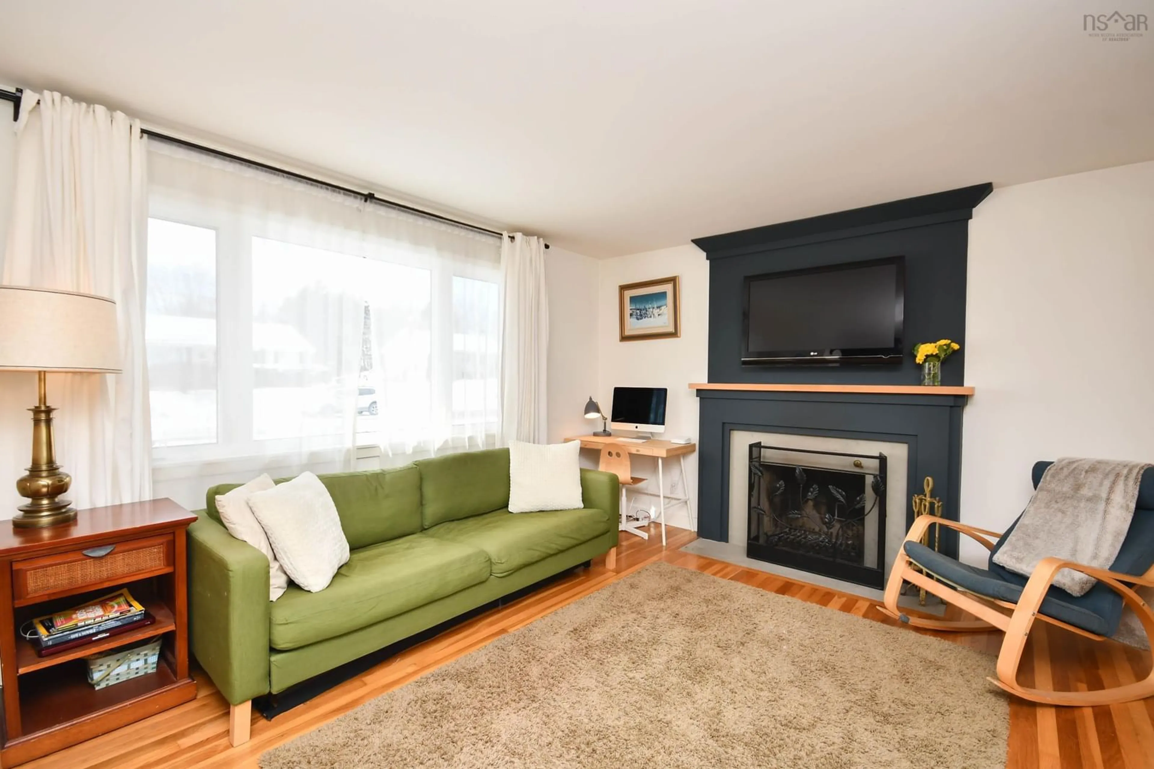 Living room with furniture, wood/laminate floor for 16 Walters St, Dartmouth Nova Scotia B2W 1T2