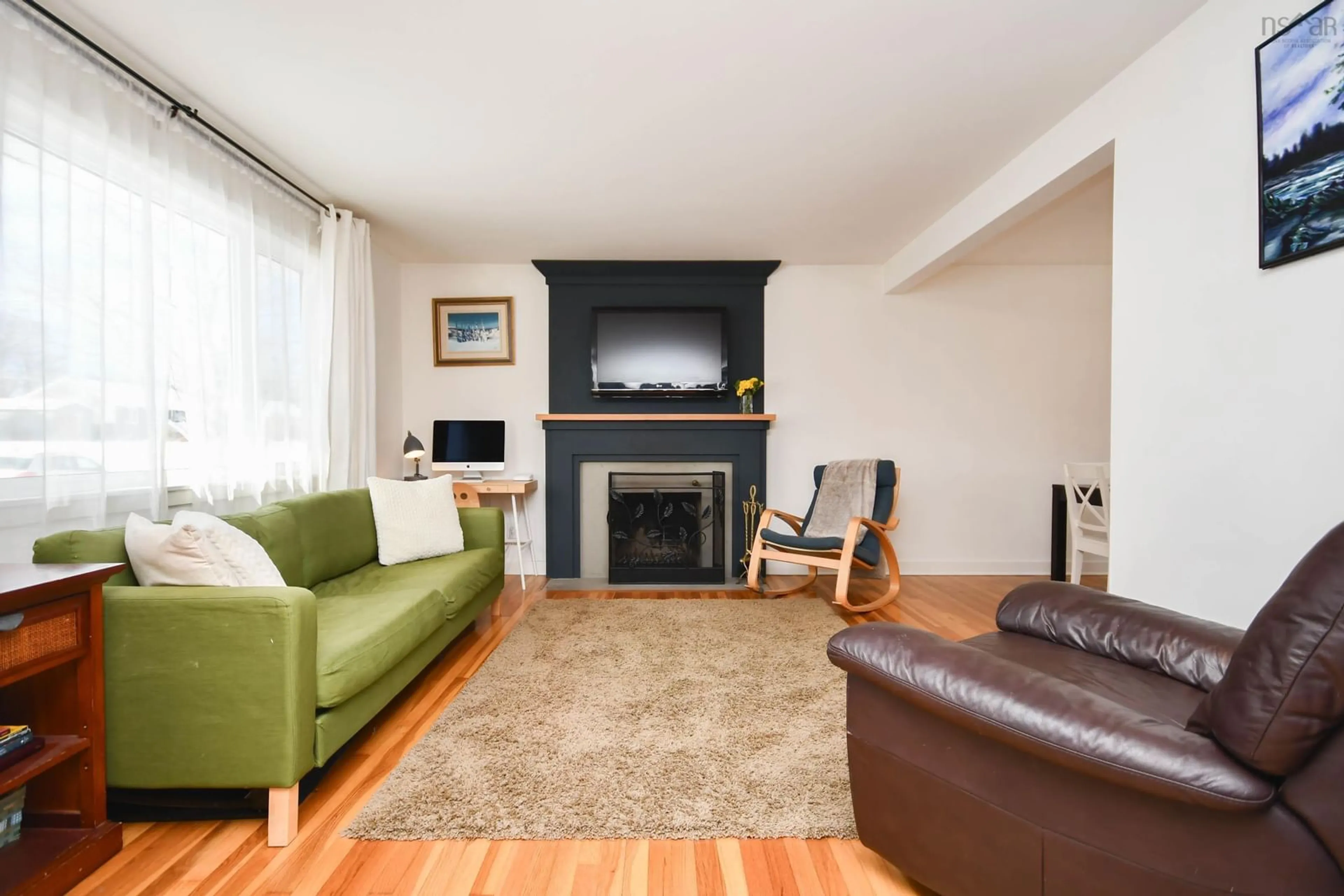 Living room with furniture, wood/laminate floor for 16 Walters St, Dartmouth Nova Scotia B2W 1T2