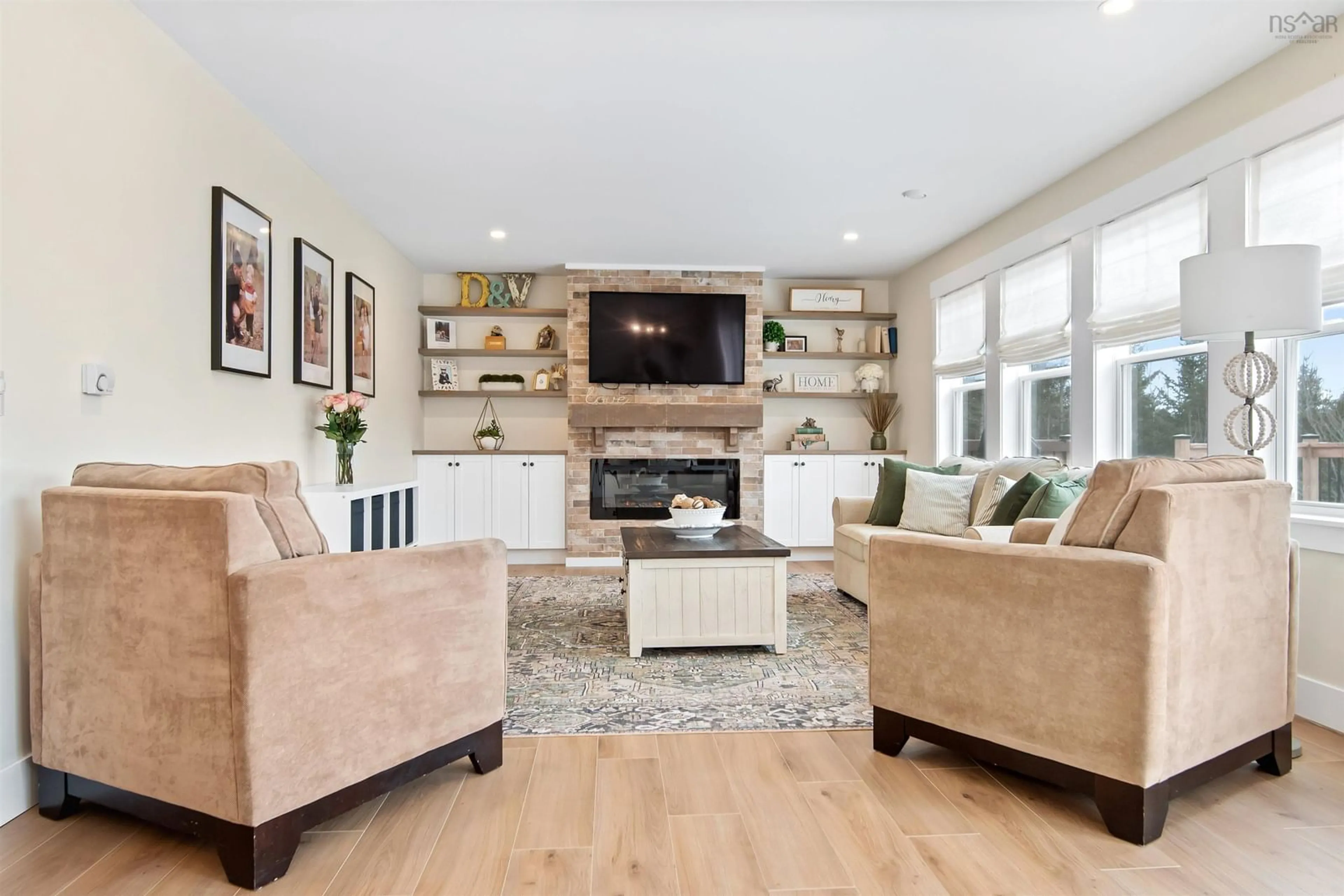 Living room with furniture, wood/laminate floor for 96 Clubmoss Lane, Middle Sackville Nova Scotia B4E 0P1