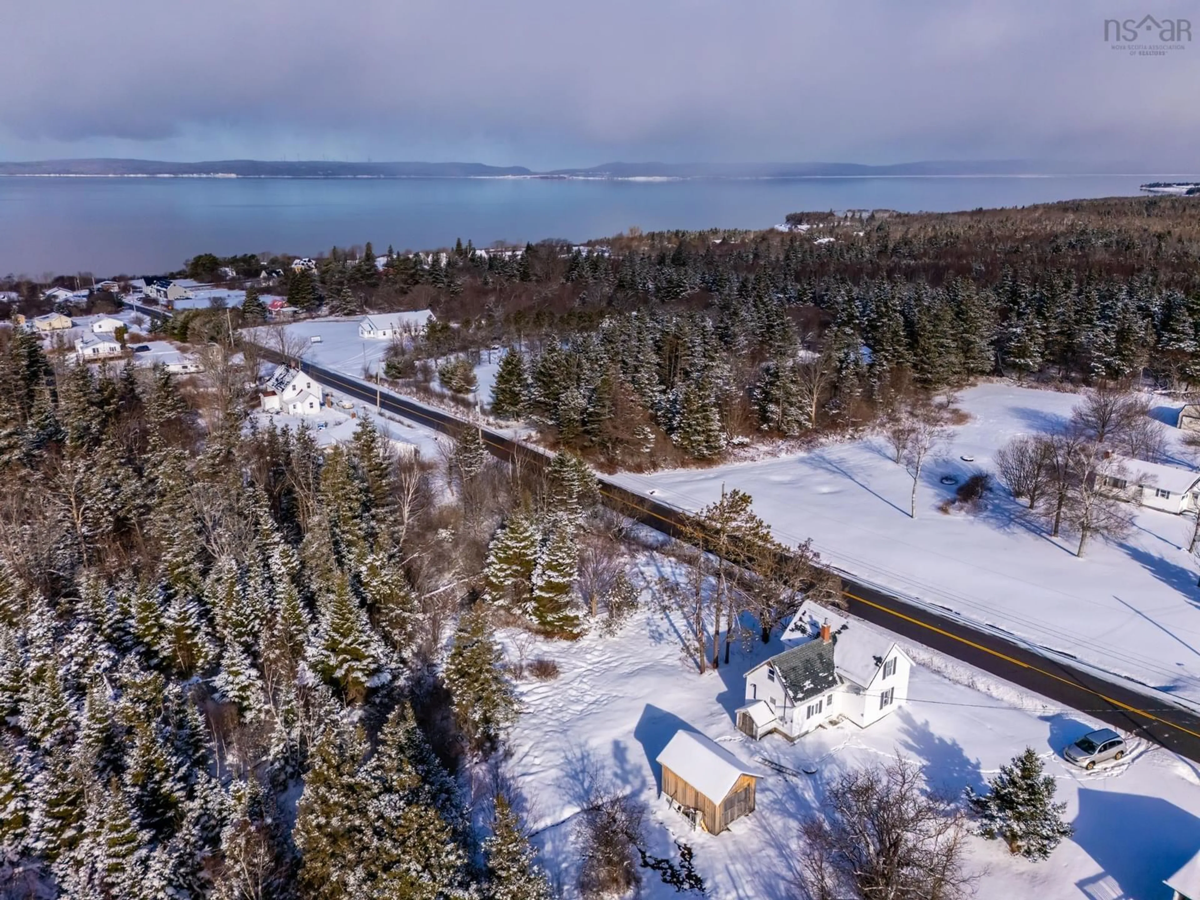 A pic from outside/outdoor area/front of a property/back of a property/a pic from drone, water/lake/river/ocean view for 102 French Rd, Plympton Nova Scotia B0W 2R0