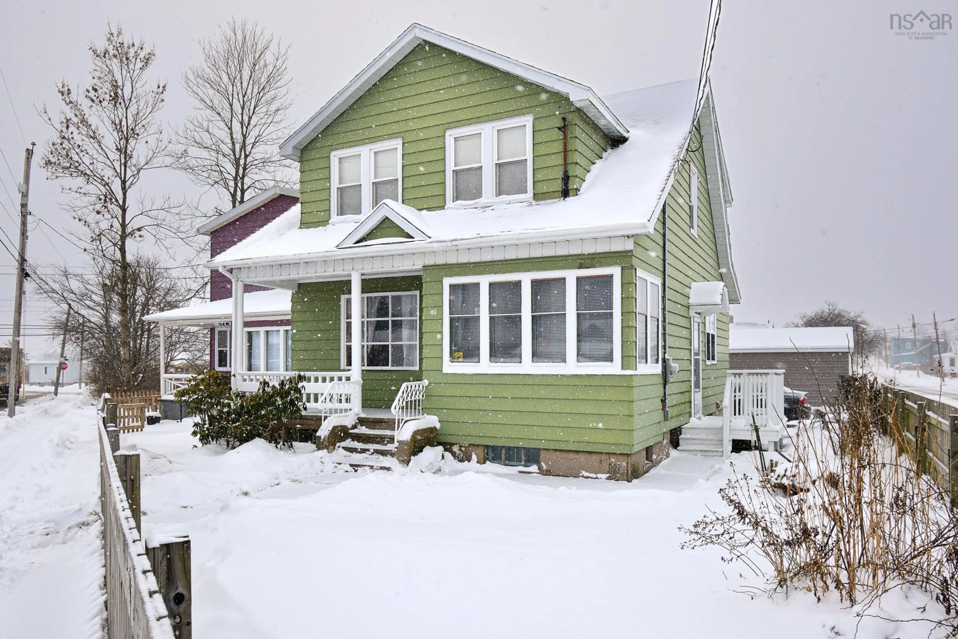 Home with vinyl exterior material, street for 49 Fisher St, Sydney Nova Scotia B1N 1P6