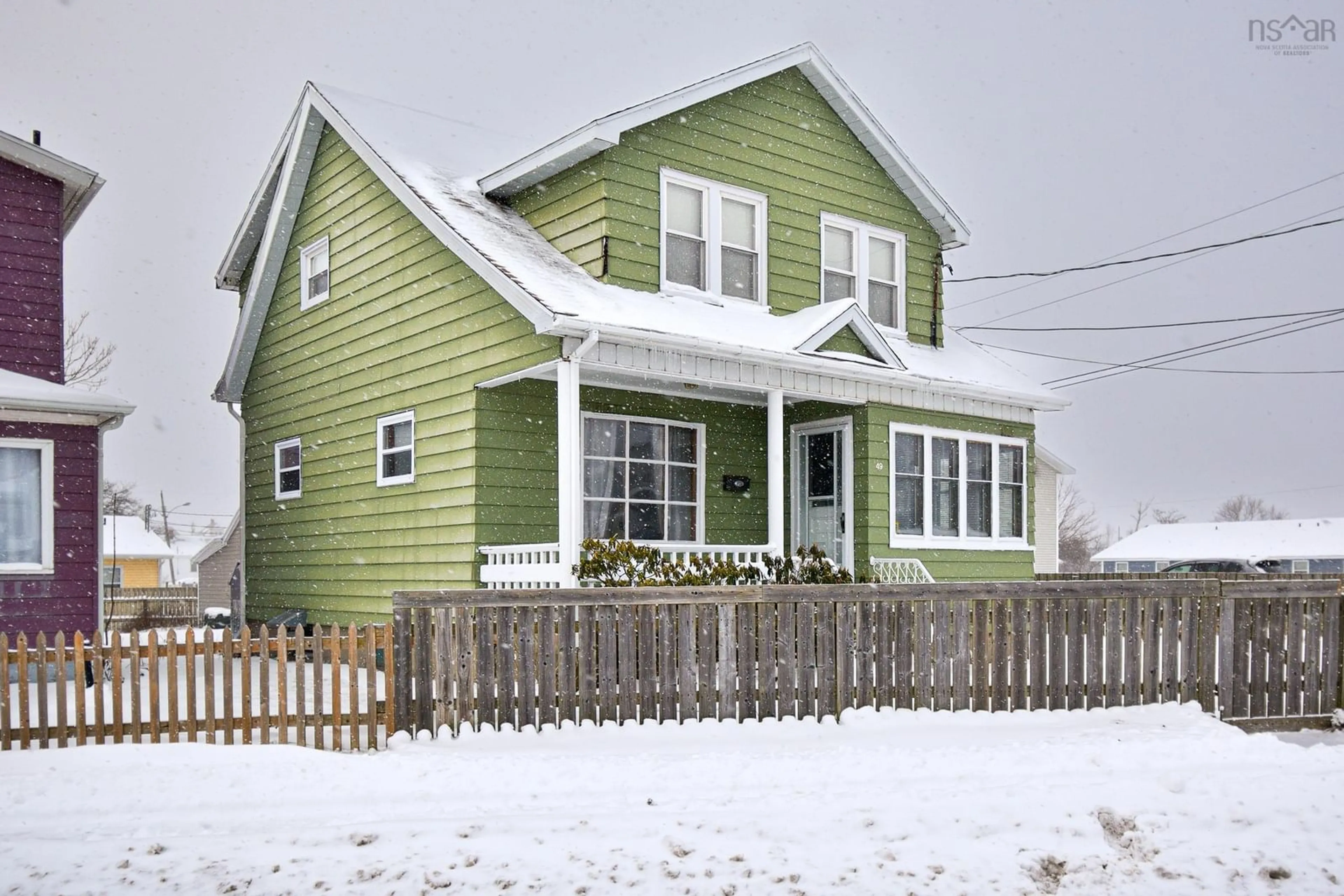 Home with vinyl exterior material, street for 49 Fisher St, Sydney Nova Scotia B1N 1P6