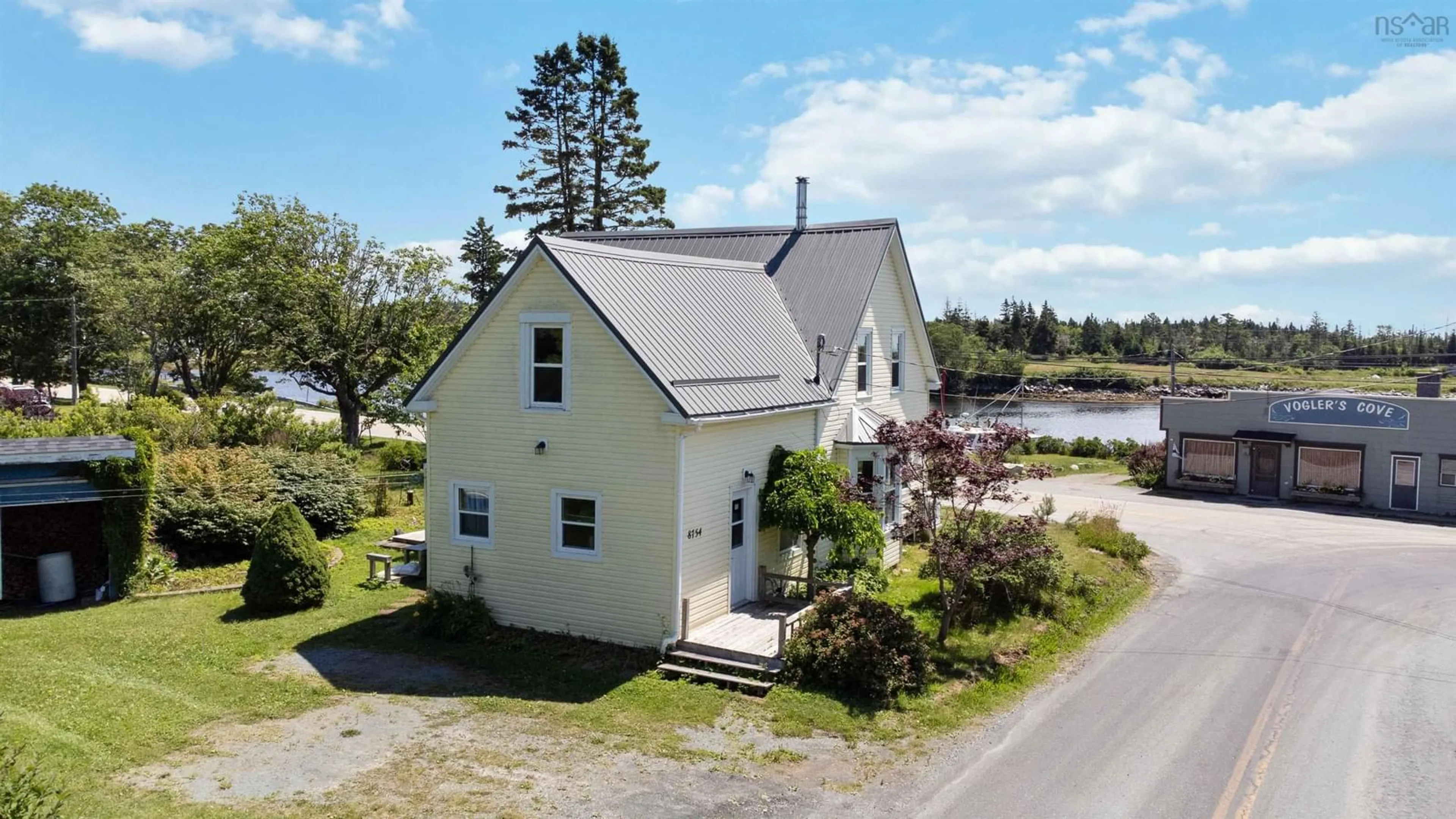 A pic from outside/outdoor area/front of a property/back of a property/a pic from drone, water/lake/river/ocean view for 8754 Highway 331, Voglers Cove Nova Scotia B0J 2H0