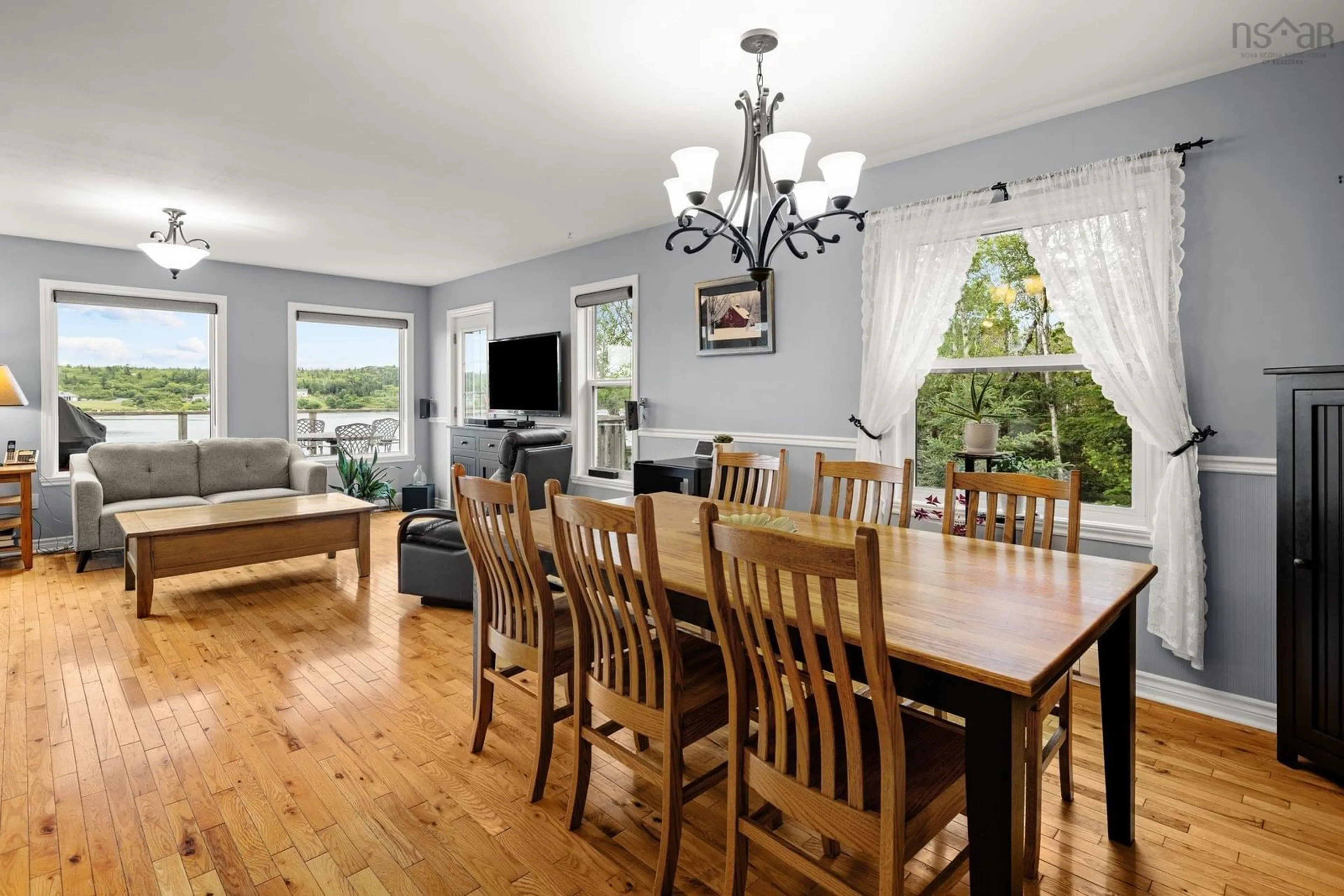 Dining room, wood/laminate floor for 1072 Terence Bay Rd, Terence Bay Nova Scotia B3T 1X5